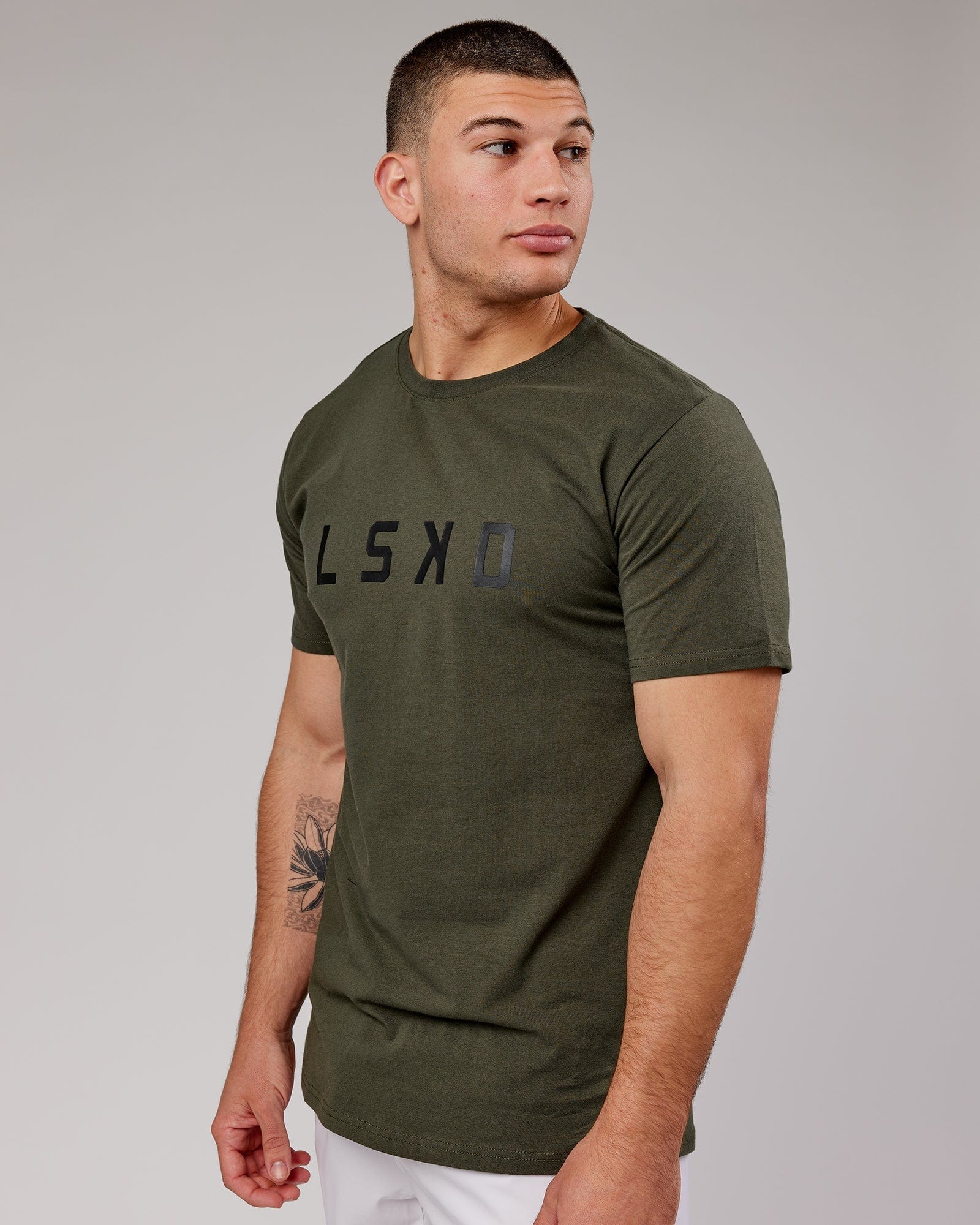 Model wearing Power FLXDRY Performance Tee - Forest Night