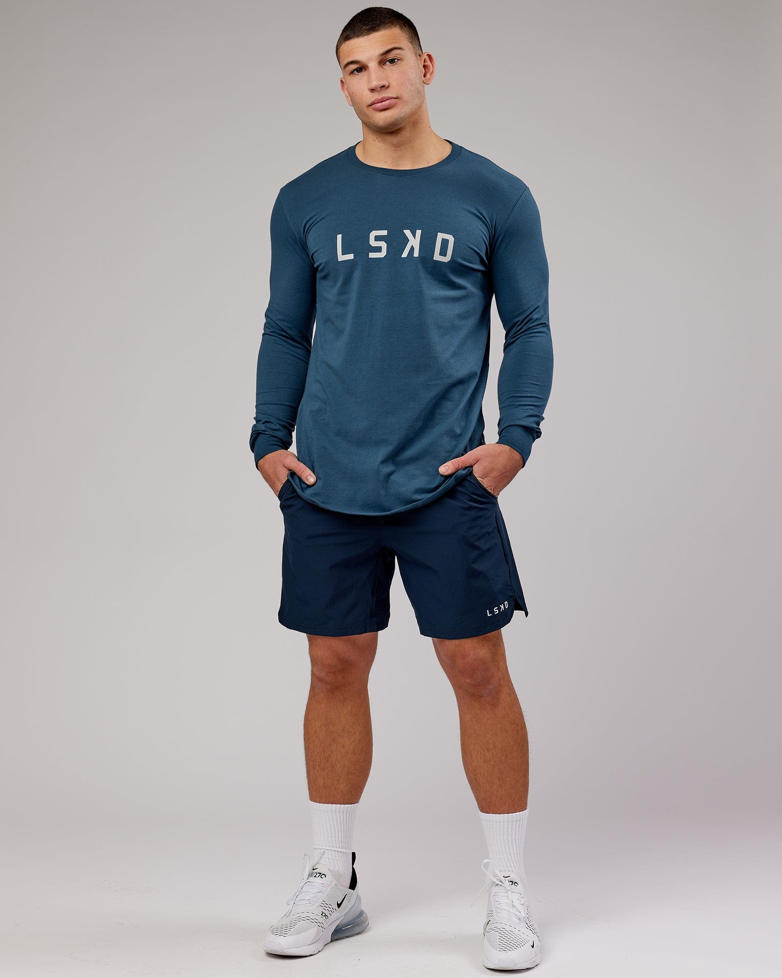 Model wearing Power FLXDRY Performance LS Tee - Light Navy