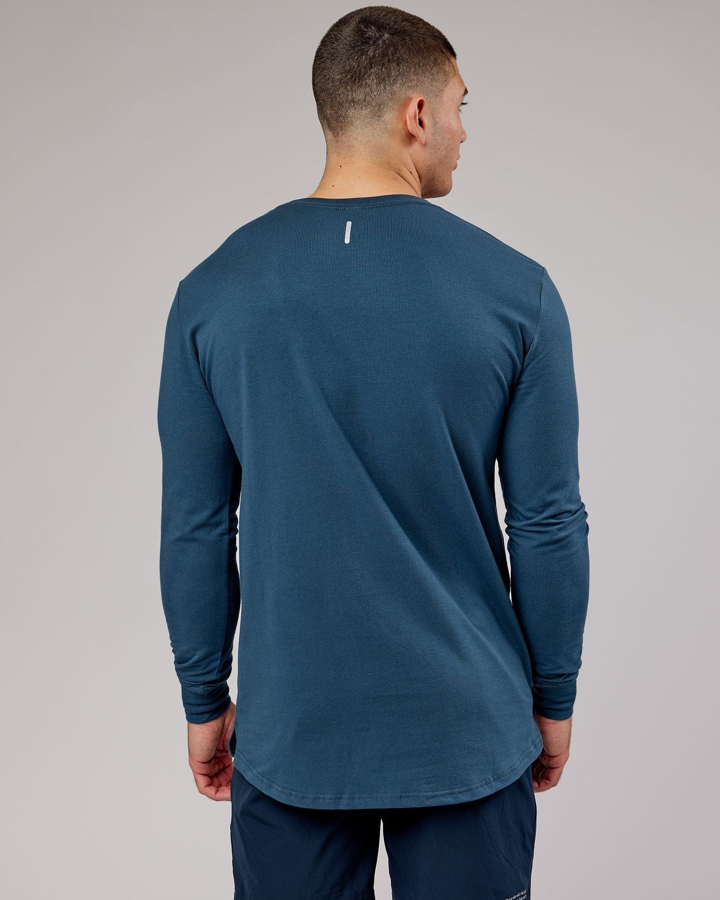 Model wearing Power FLXDRY Performance LS Tee - Light Navy