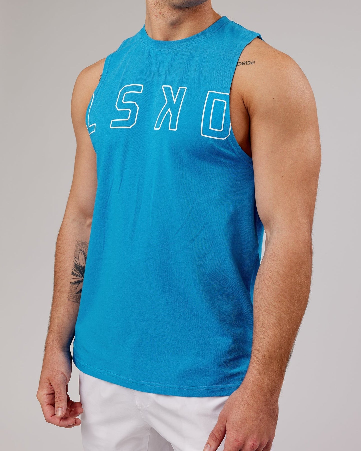 Model wearing Expand FLXCotton Training Fit Tank - Ibiza Blue