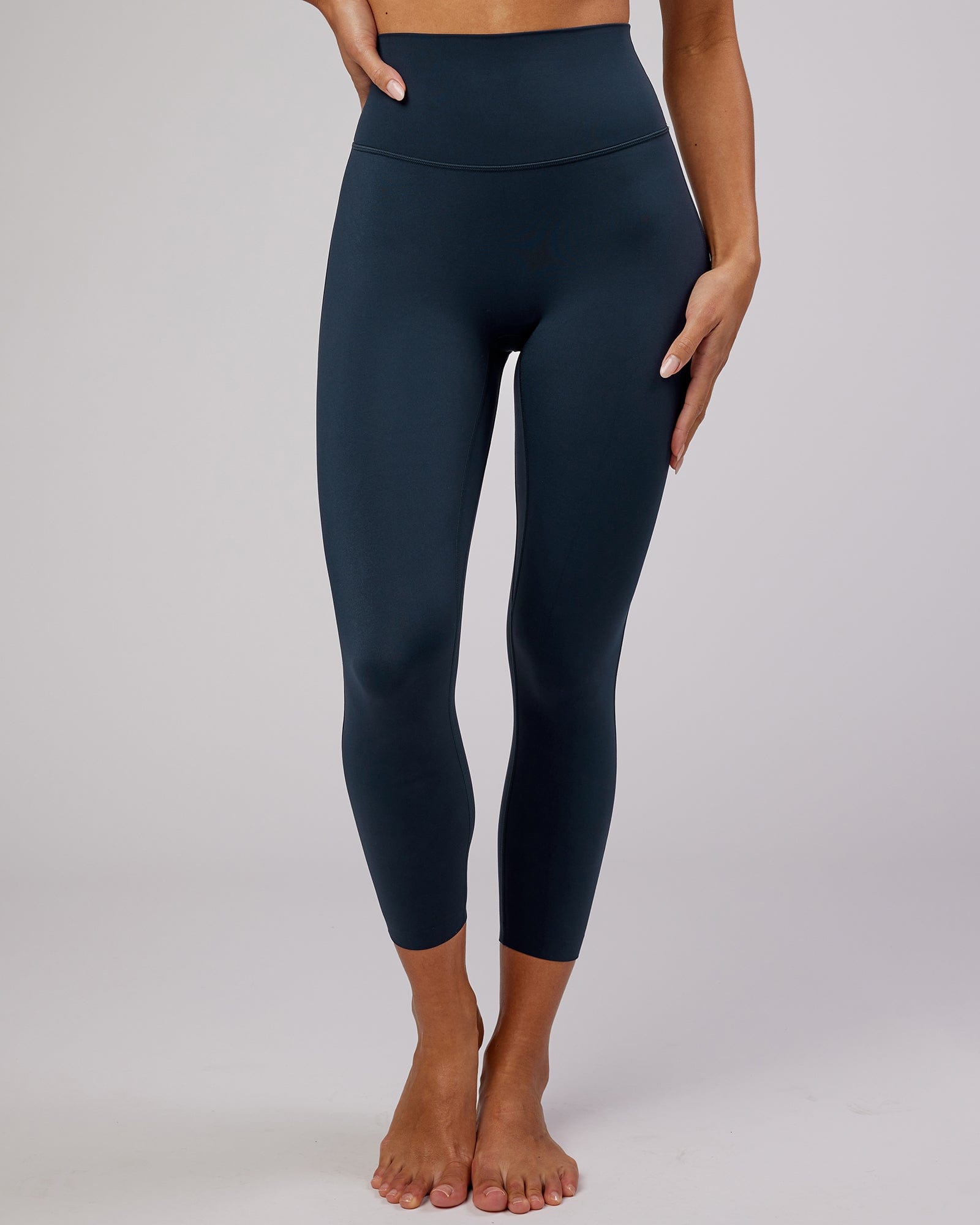 Model wearing Elixir 7/8 Length Tight - Navy No Logo