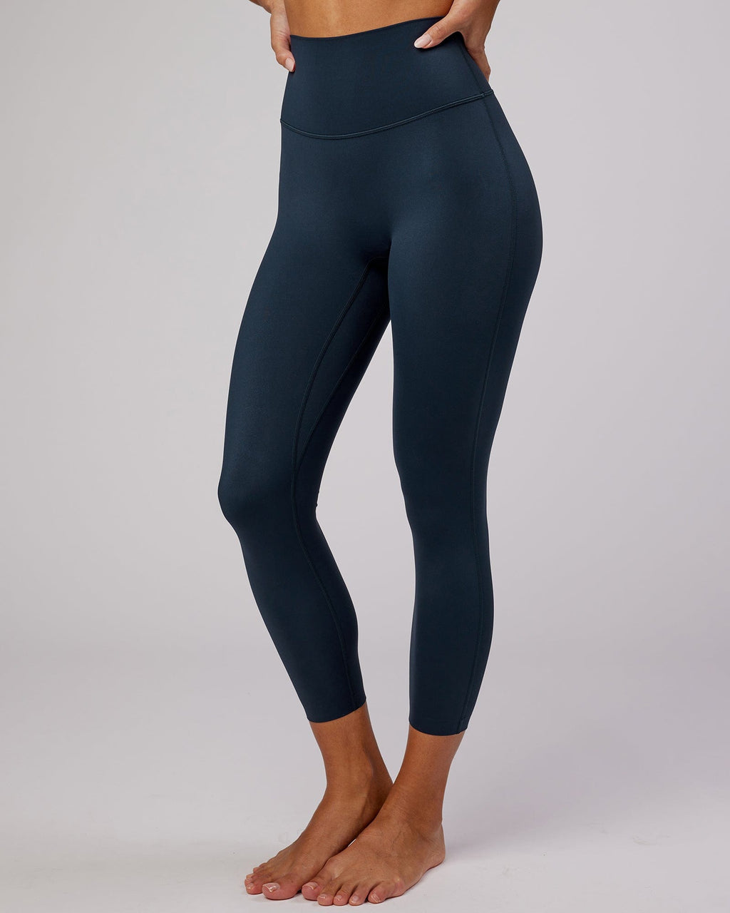 Model wearing Elixir 7/8 Length Tight - Navy No Logo