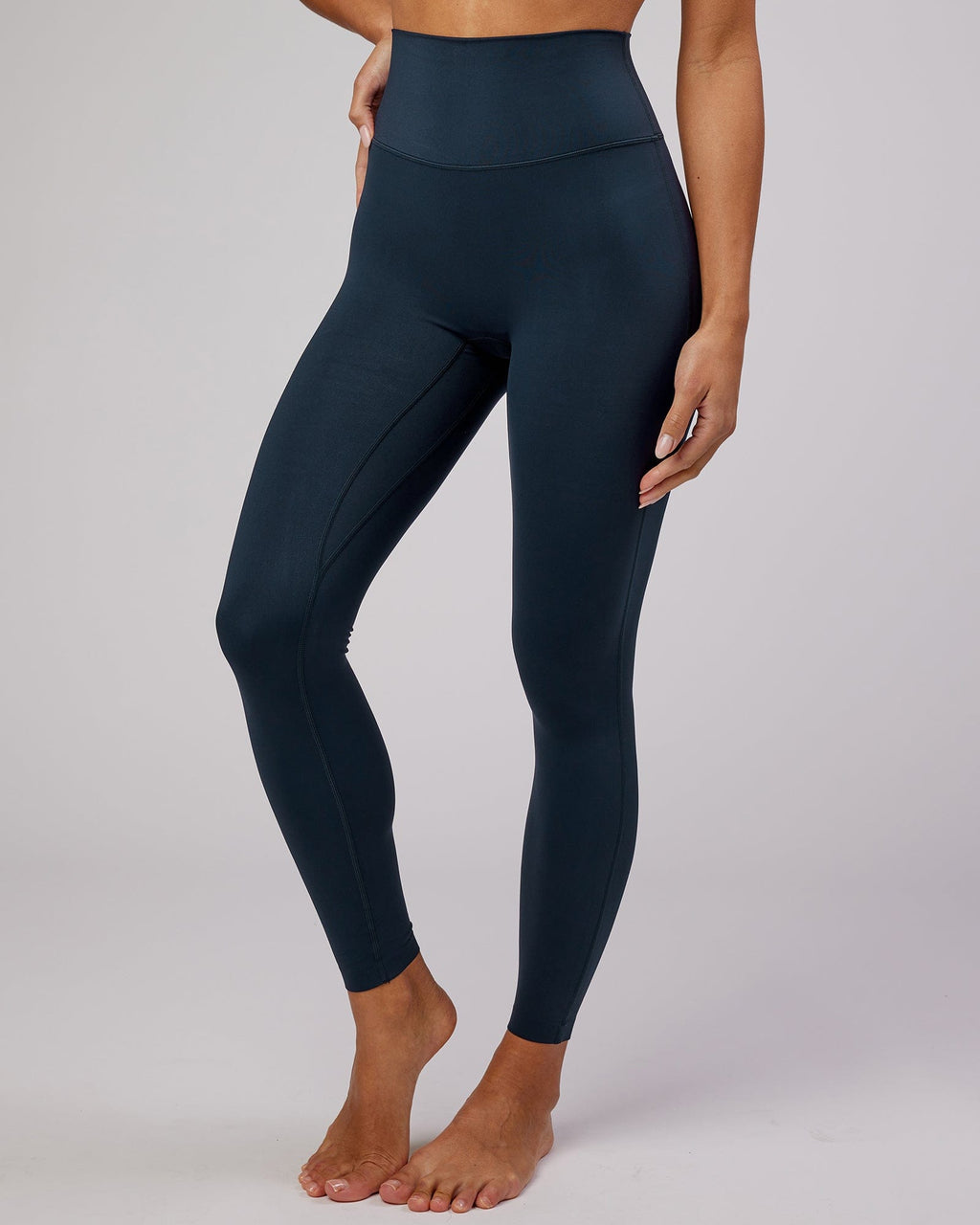Model wearing Elixir Full Length Tight - Navy No Logo