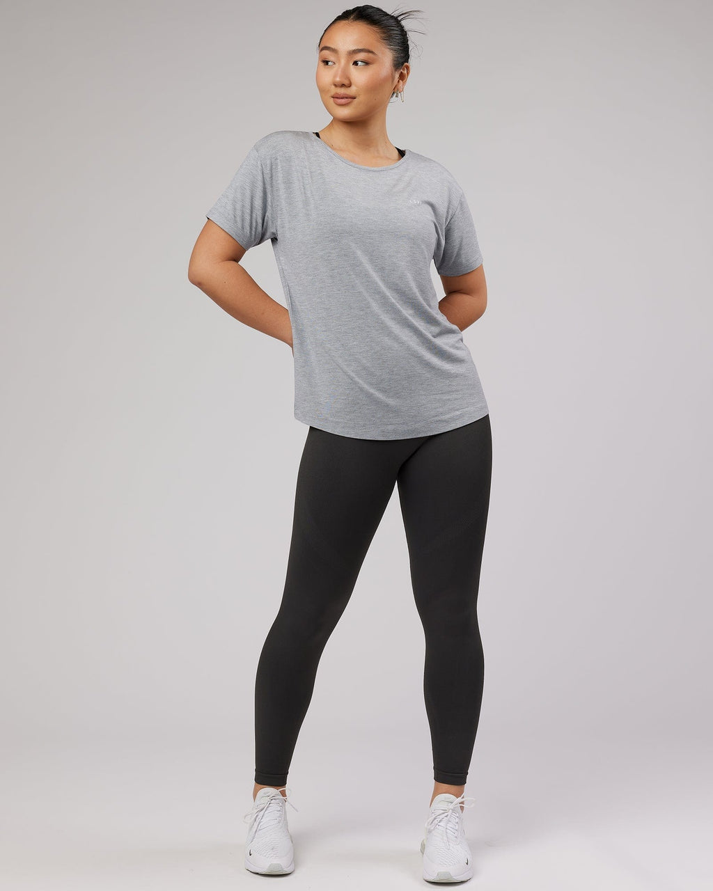 Model wearing Air Slouch Tee - Lt Grey Marl