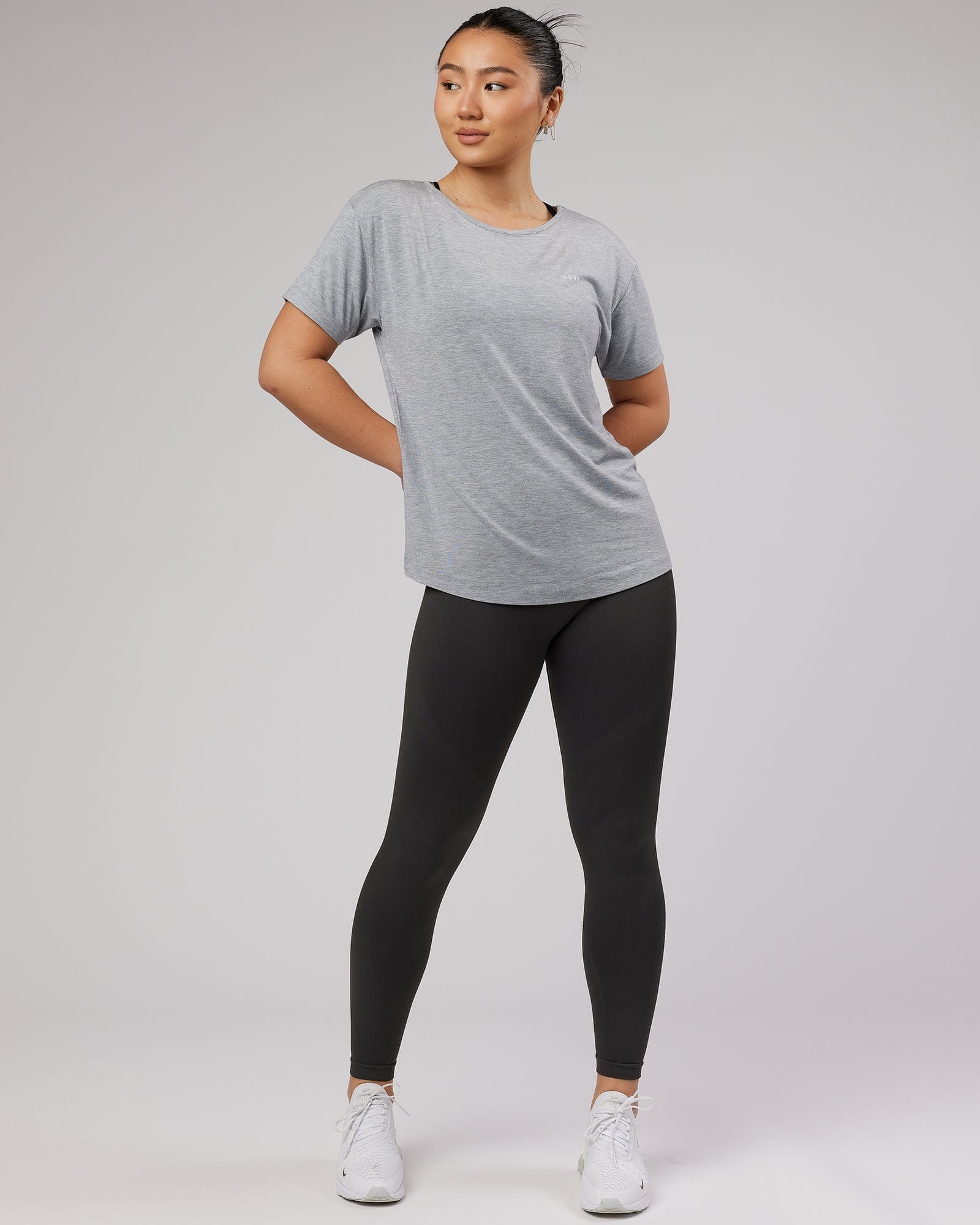 Model wearing Air Slouch Tee - Lt Grey Marl