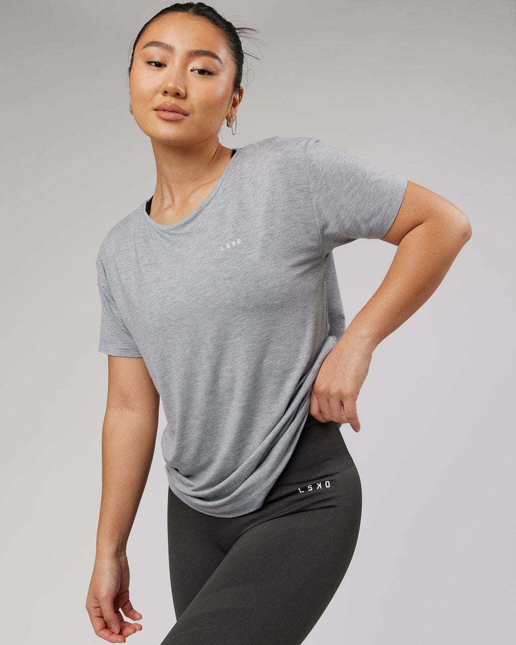 Model wearing Air Slouch Tee - Lt Grey Marl