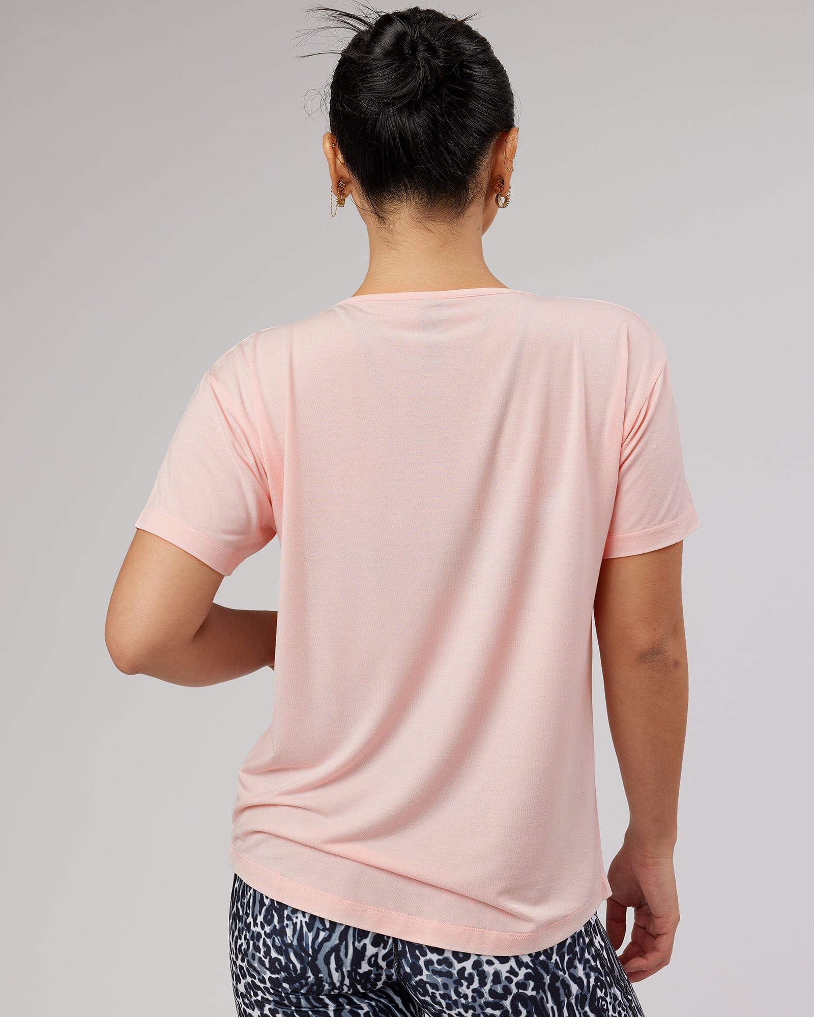 Model wearing Air Slouch Tee - Pink