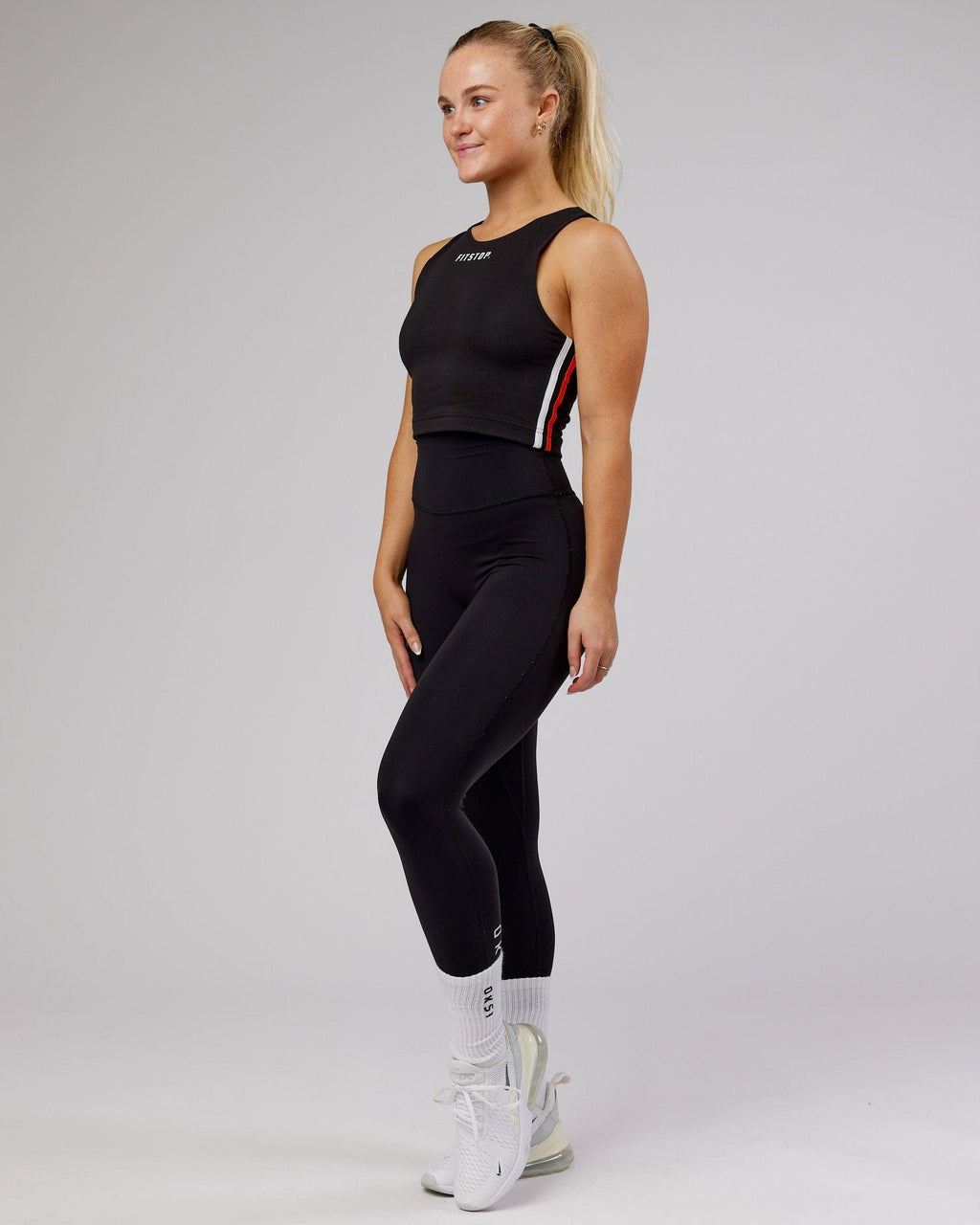 Model wearing Fitstop Warm Up Tank - Black