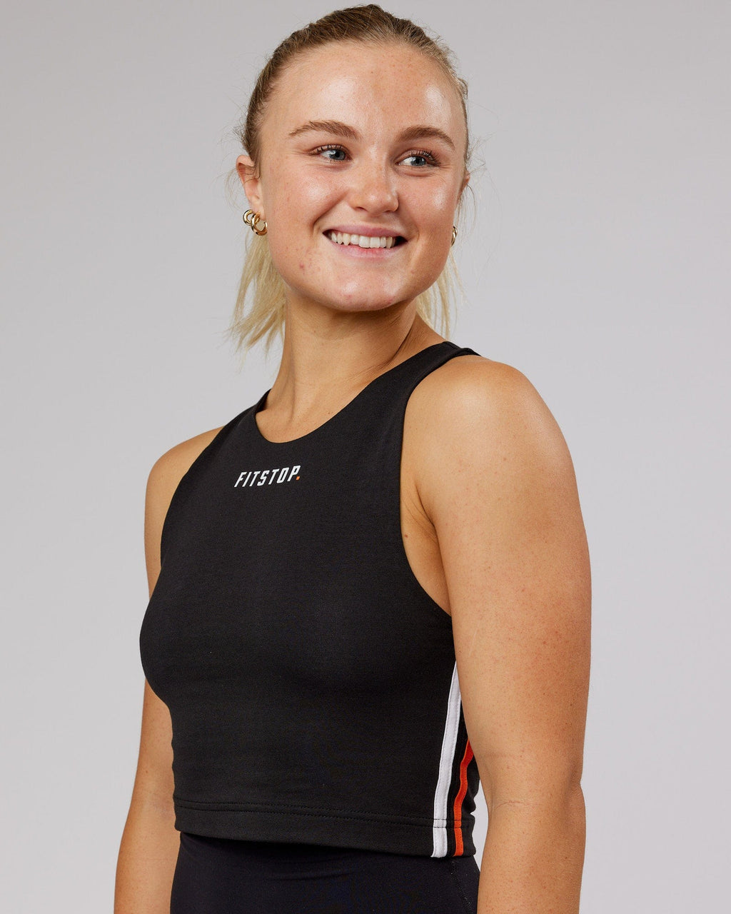 Model wearing Fitstop Warm Up Tank - Black