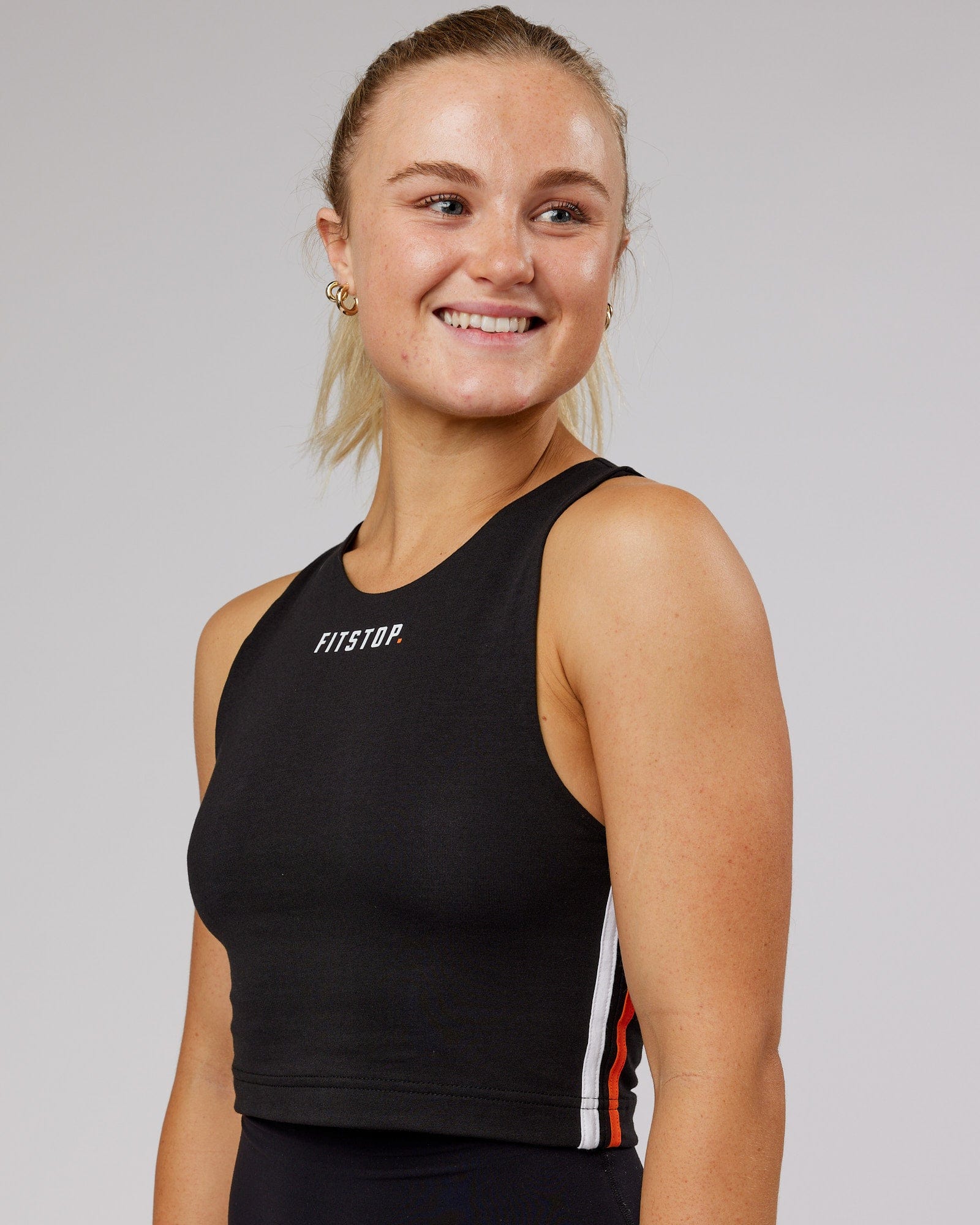 Model wearing Fitstop Warm Up Tank - Black