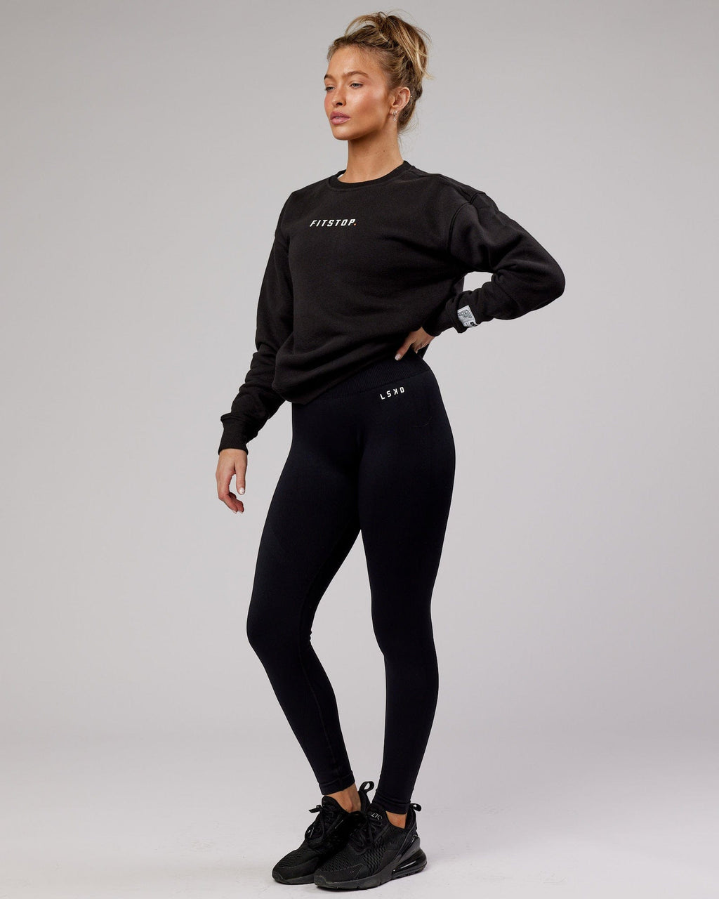 Model wearing Fitstop Functional Sweater - Black