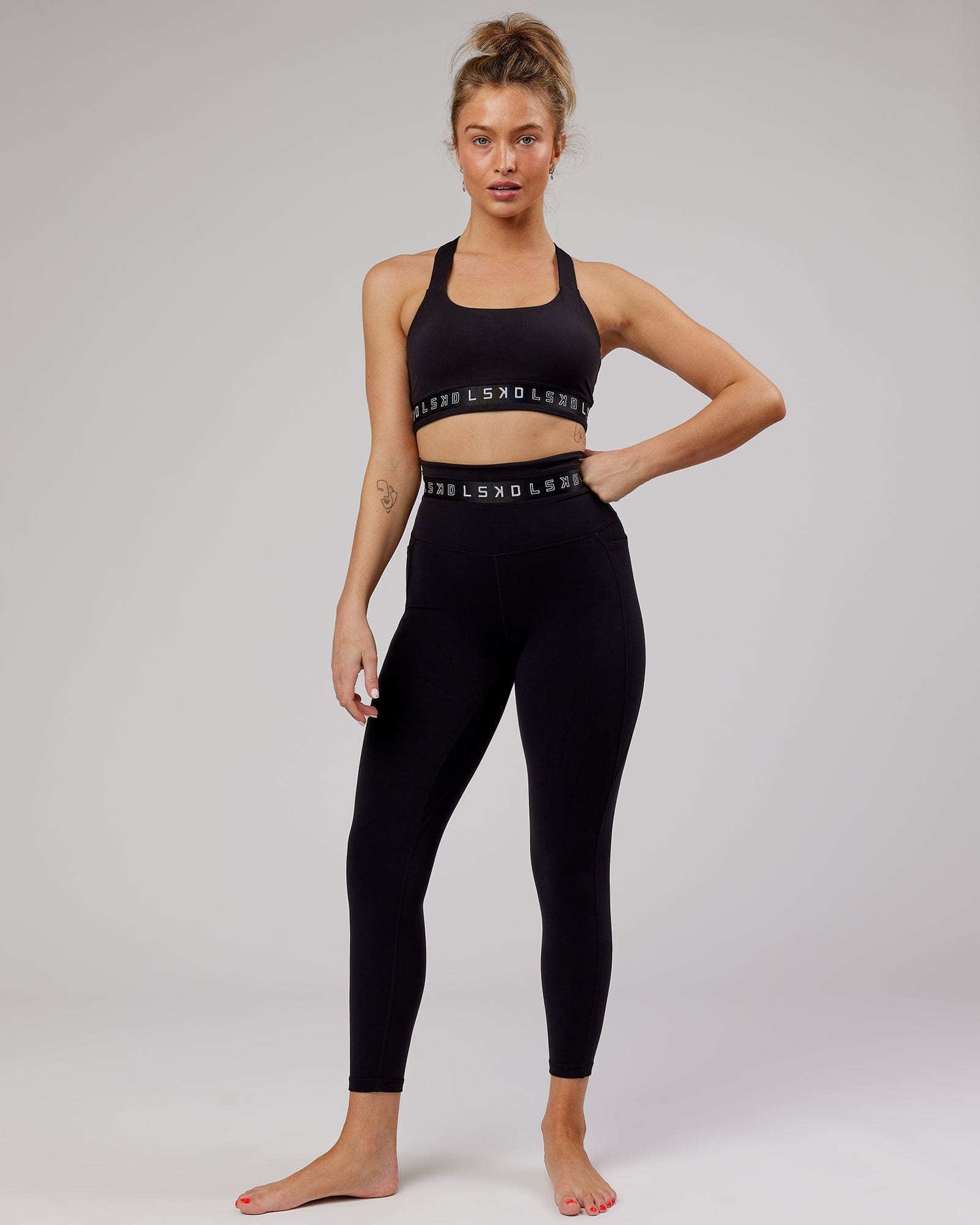 Model wearing Circuit 7/8 Length Tight - Black