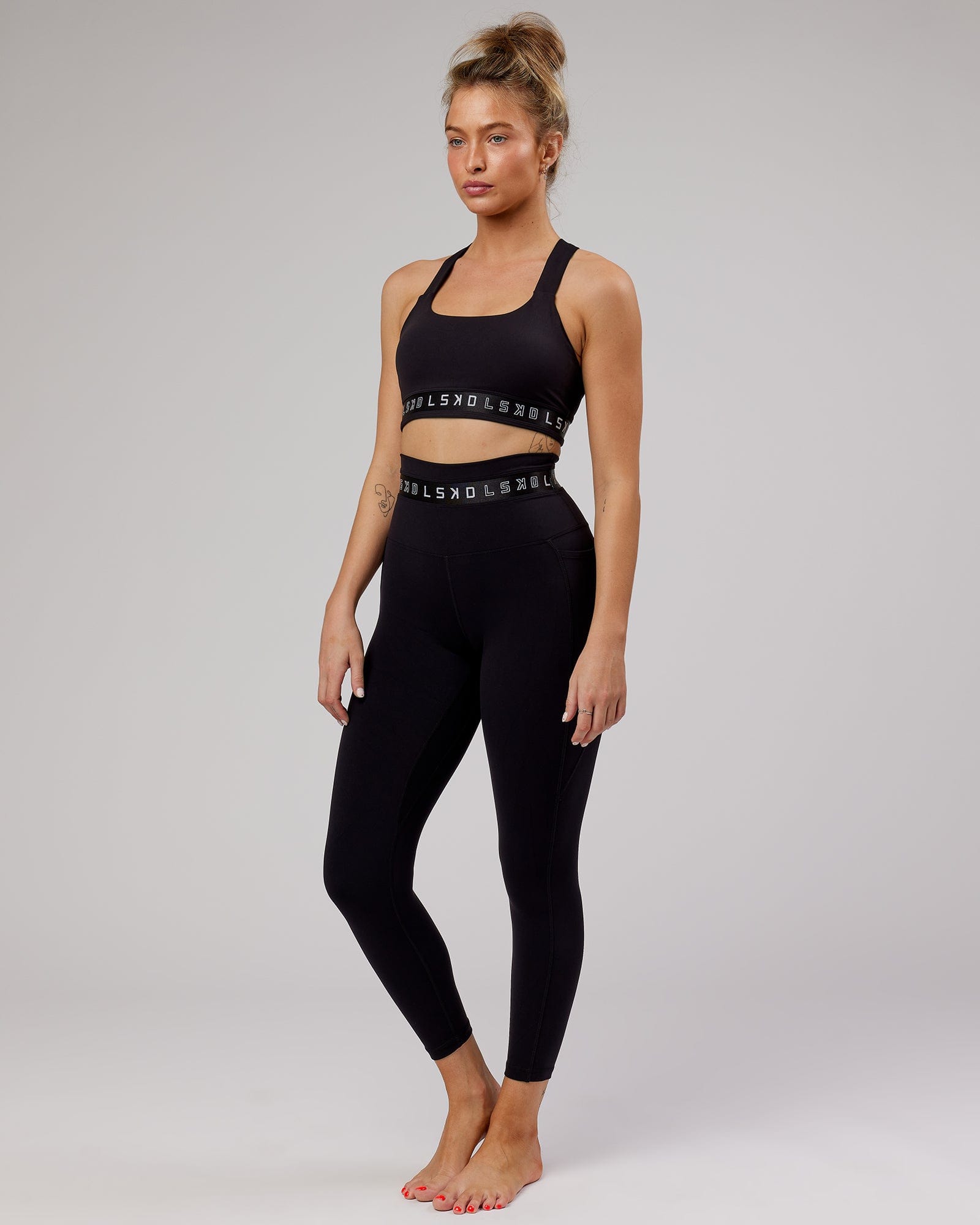 Model wearing Circuit 7/8 Length Tight - Black