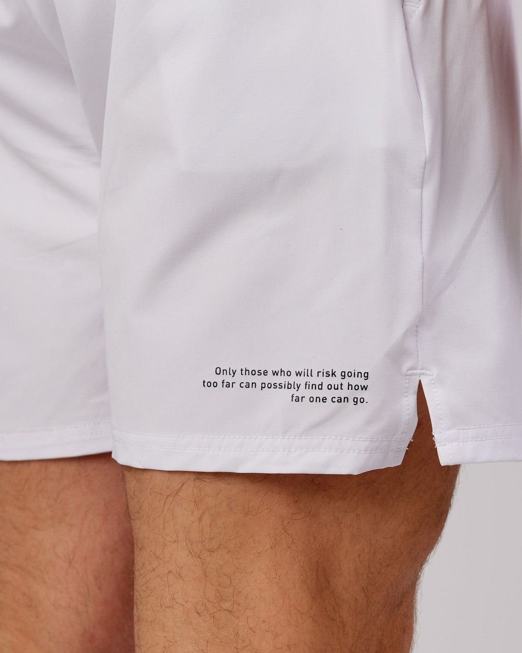 Model wearing Intensity 7" Performance Short - White