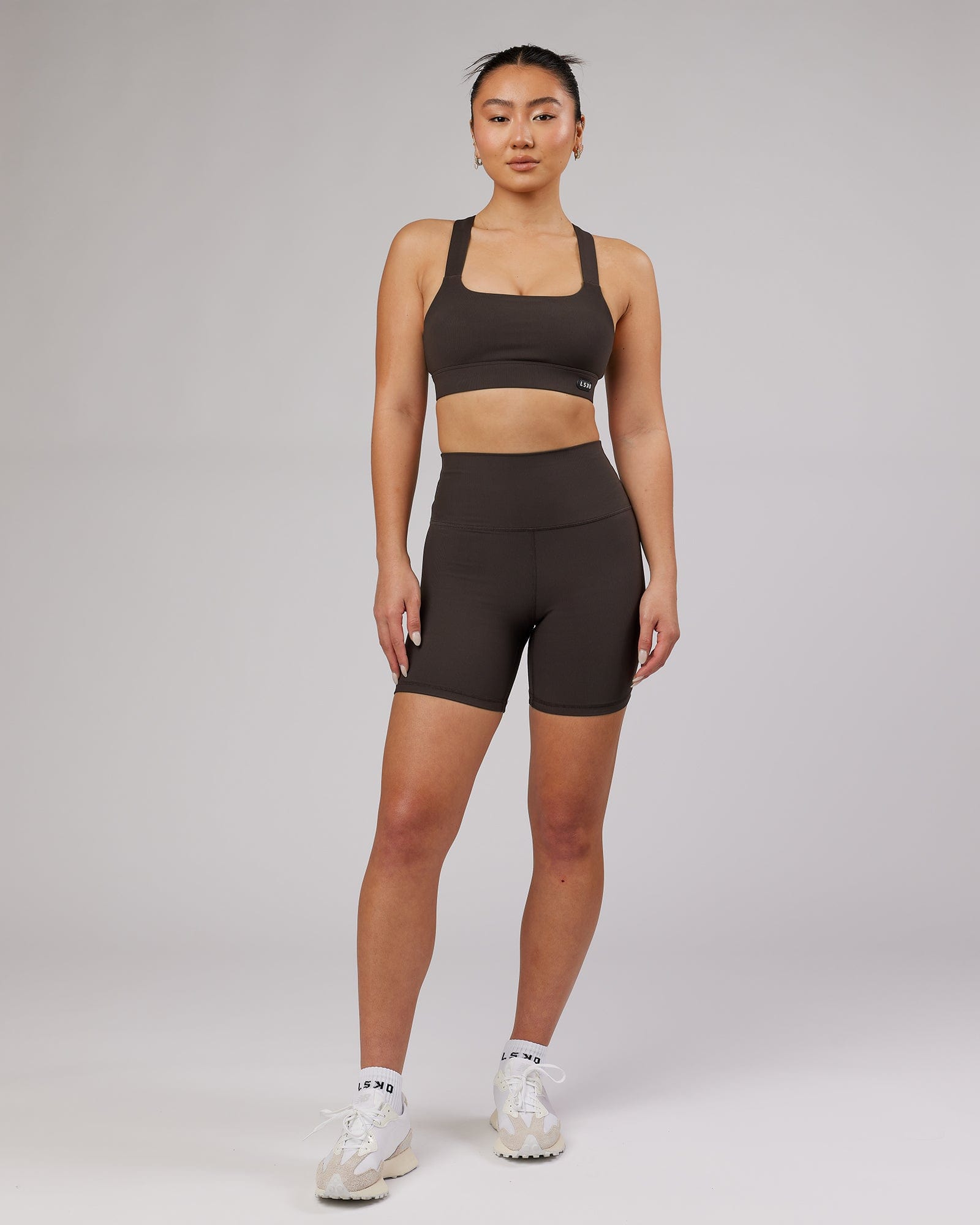 Model wearing Balance Ribbed Mid Short Tight - Dark Walnut