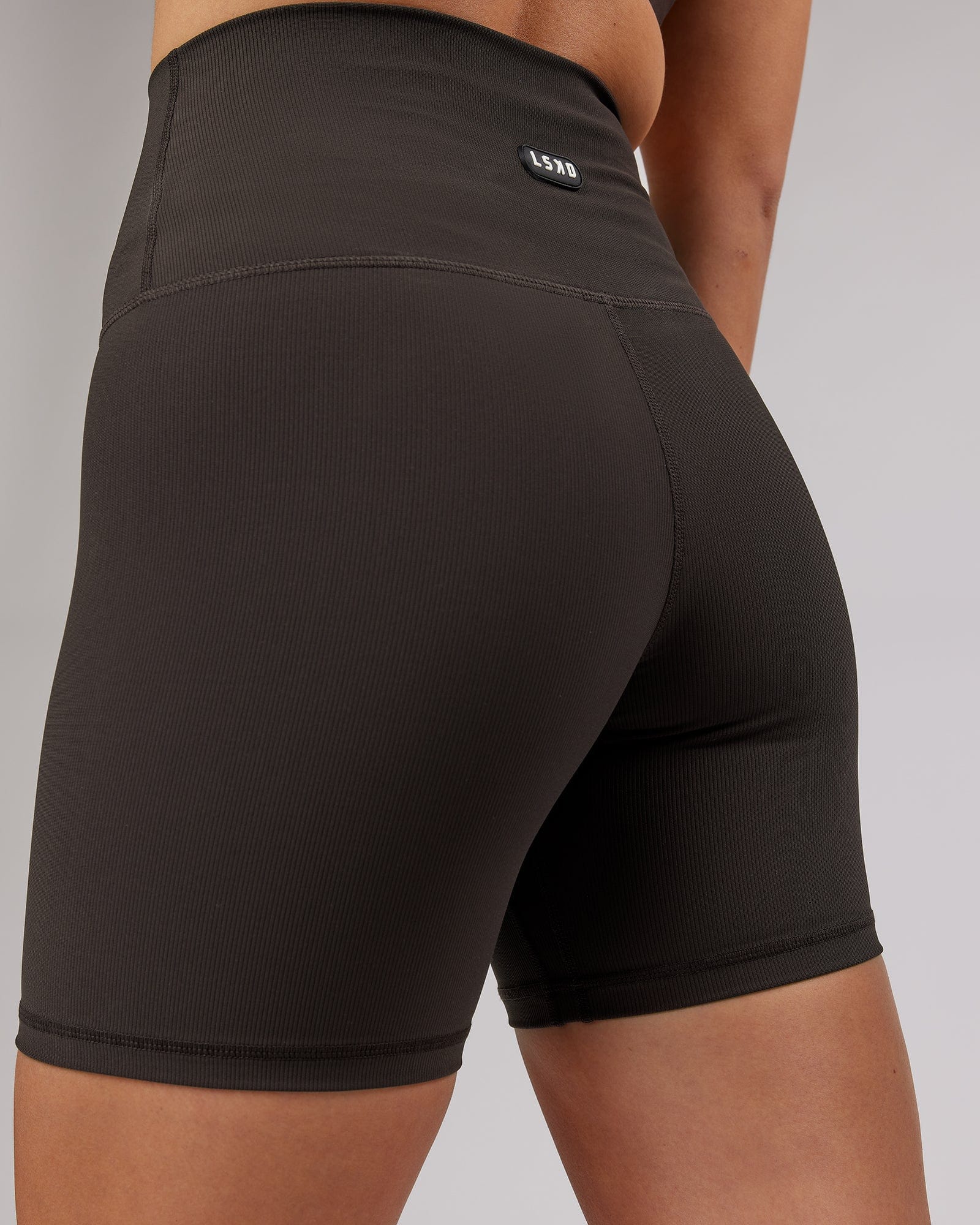 Model wearing Balance Ribbed Mid Short Tight - Dark Walnut