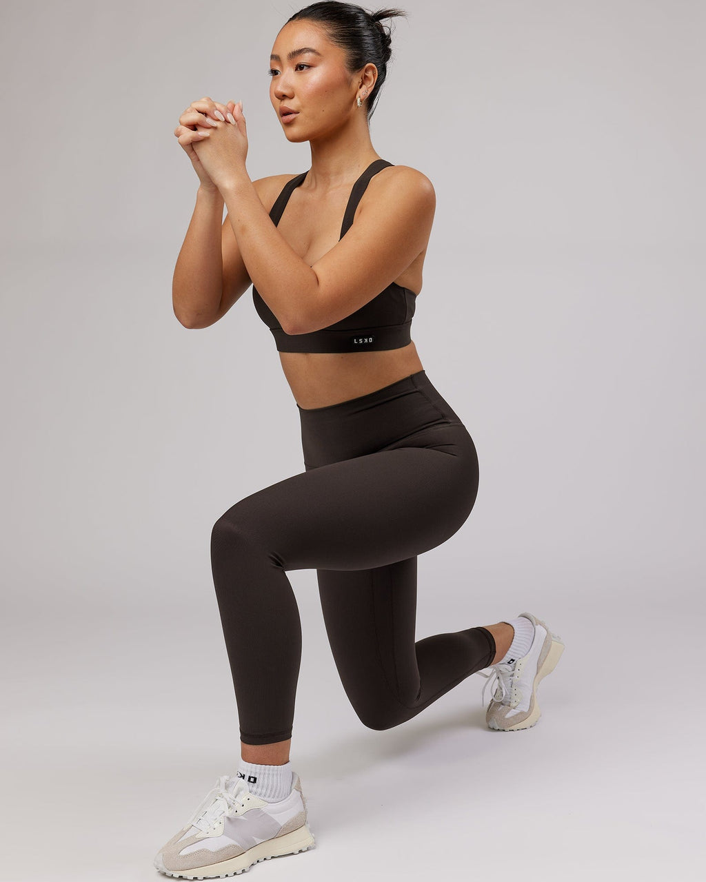 Model wearing Balance Ribbed 7/8 Length Tight - Dark Walnut