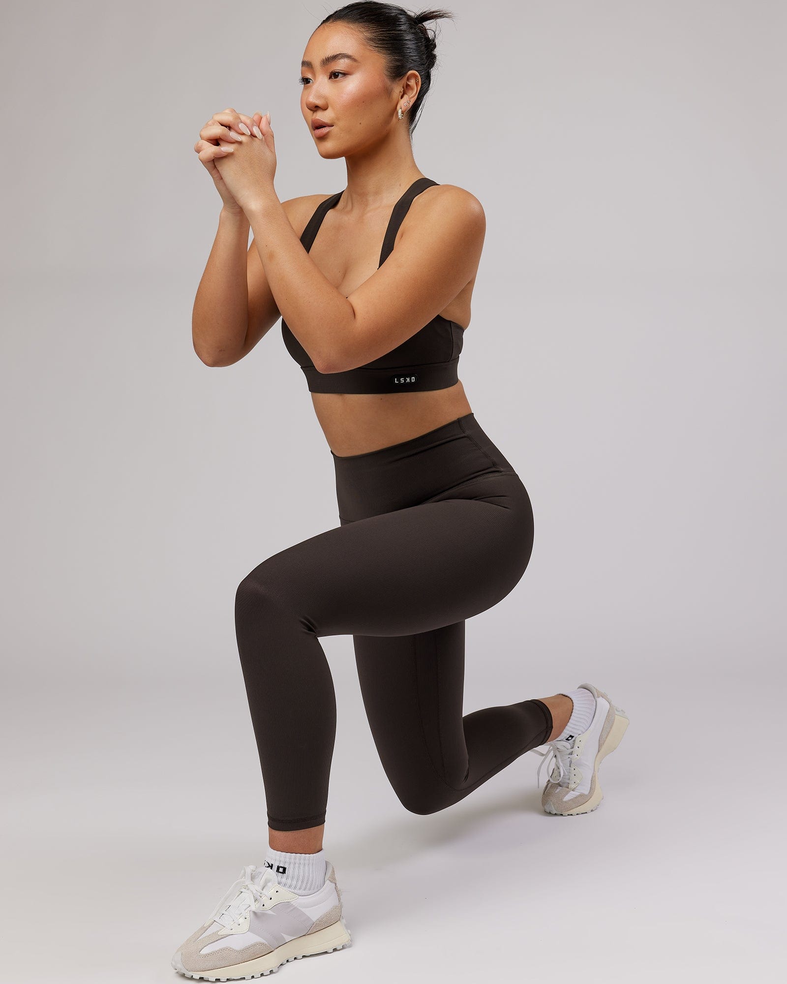 Model wearing Balance Ribbed 7/8 Length Tight - Dark Walnut