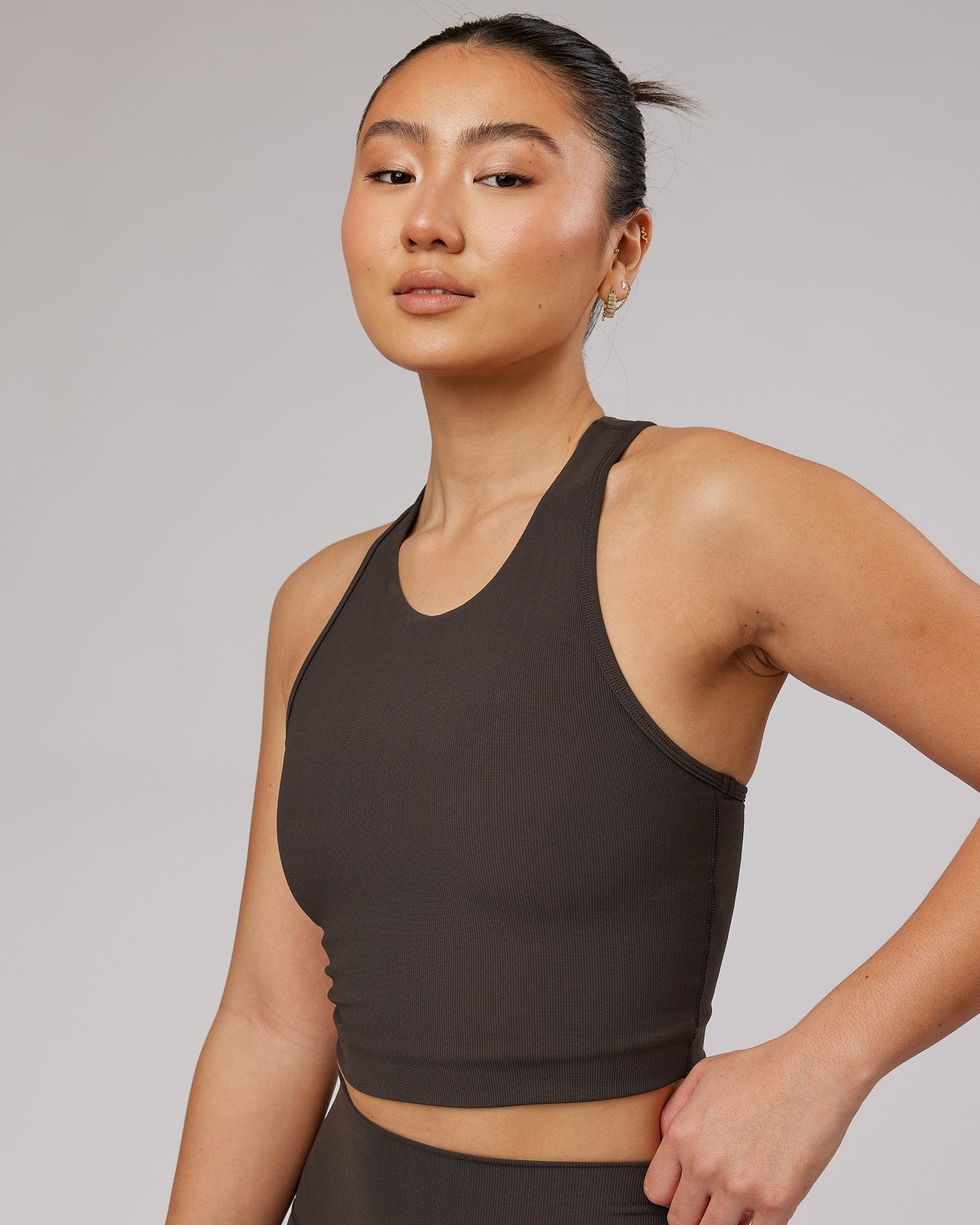 Model wearing Relay Active Rib Tank - Dark Walnut