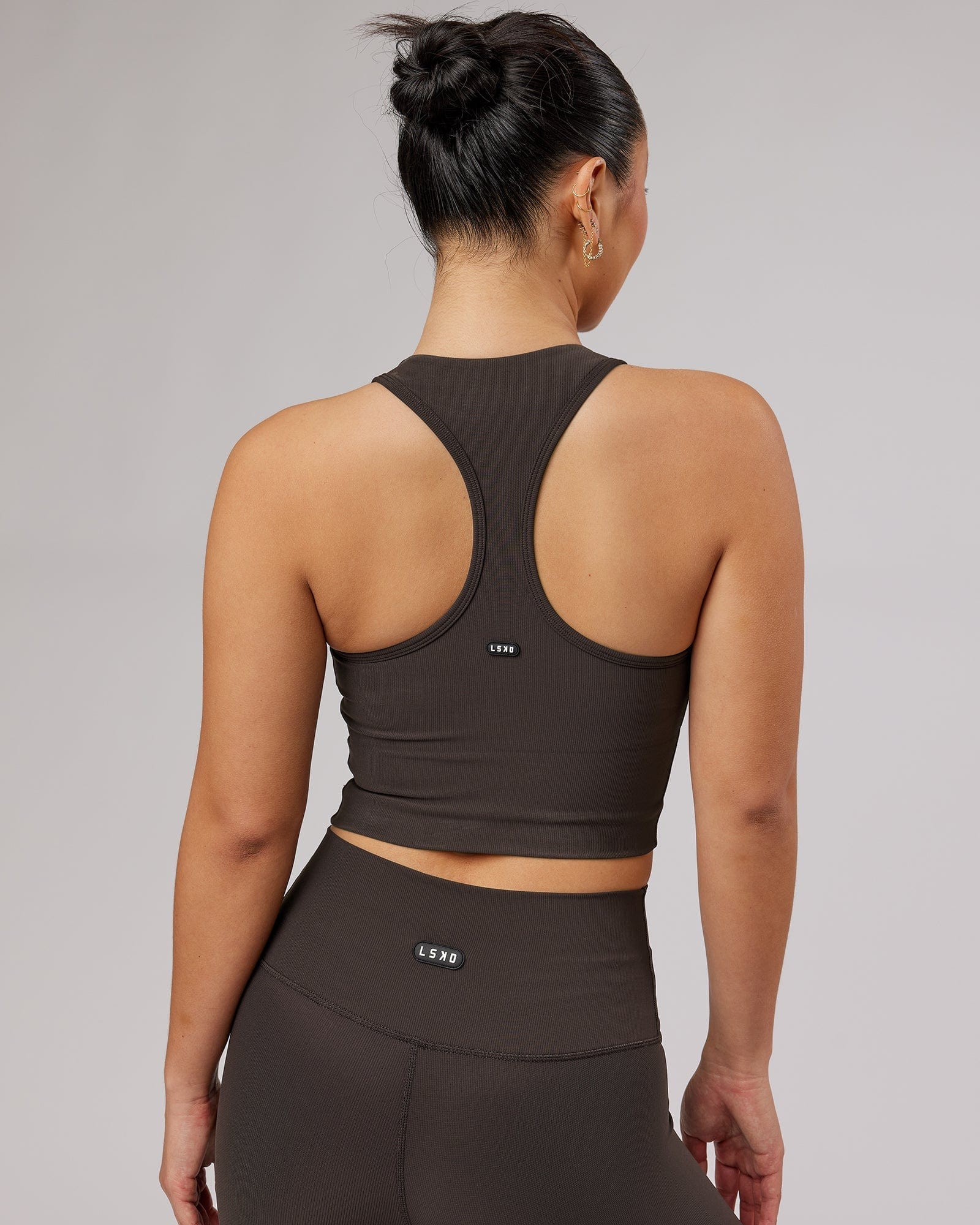 Model wearing Relay Active Rib Tank - Dark Walnut