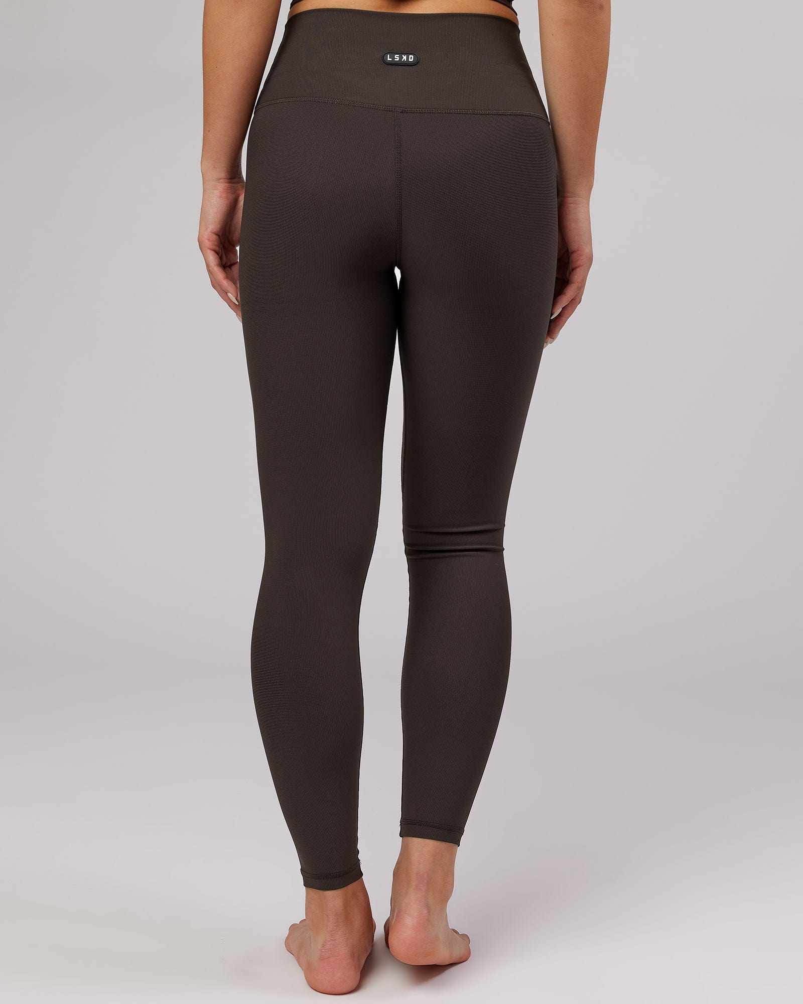 Model wearing Balance Ribbed Full Length Tight - Dark Walnut