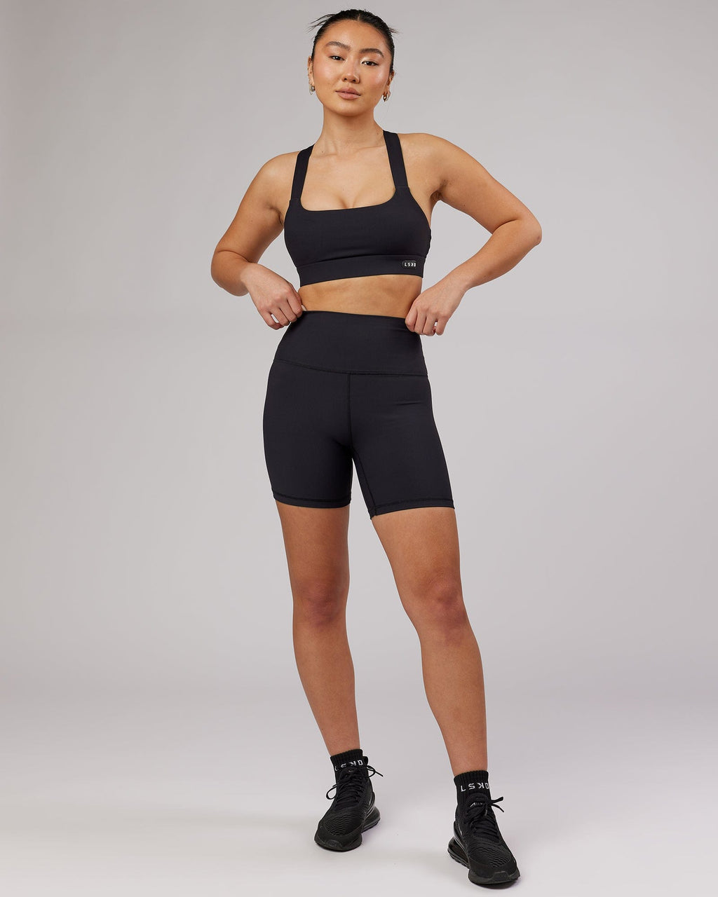 Model wearing Balance Ribbed Mid Short Tight - Black