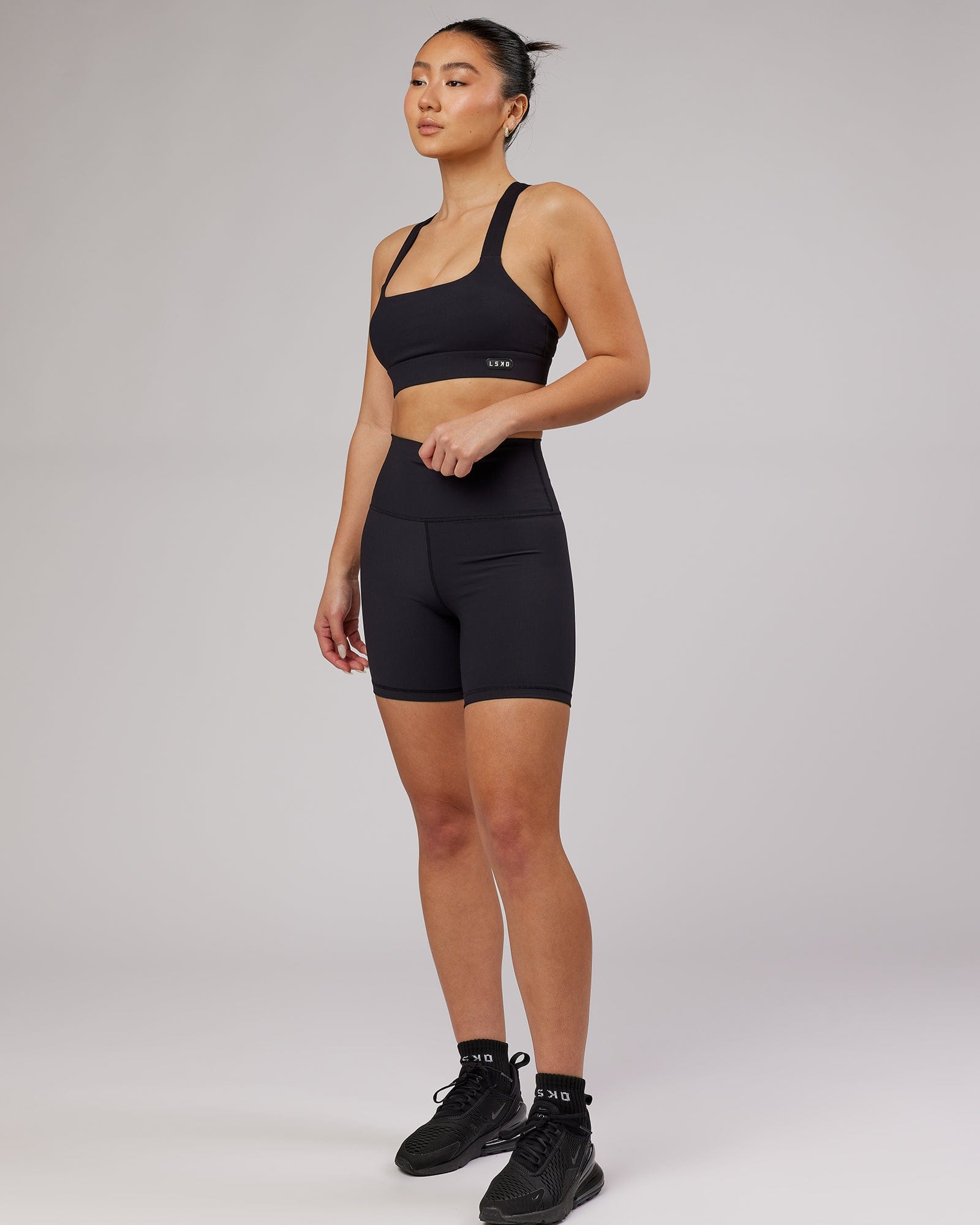 Model wearing Balance Ribbed Mid Short Tight - Black