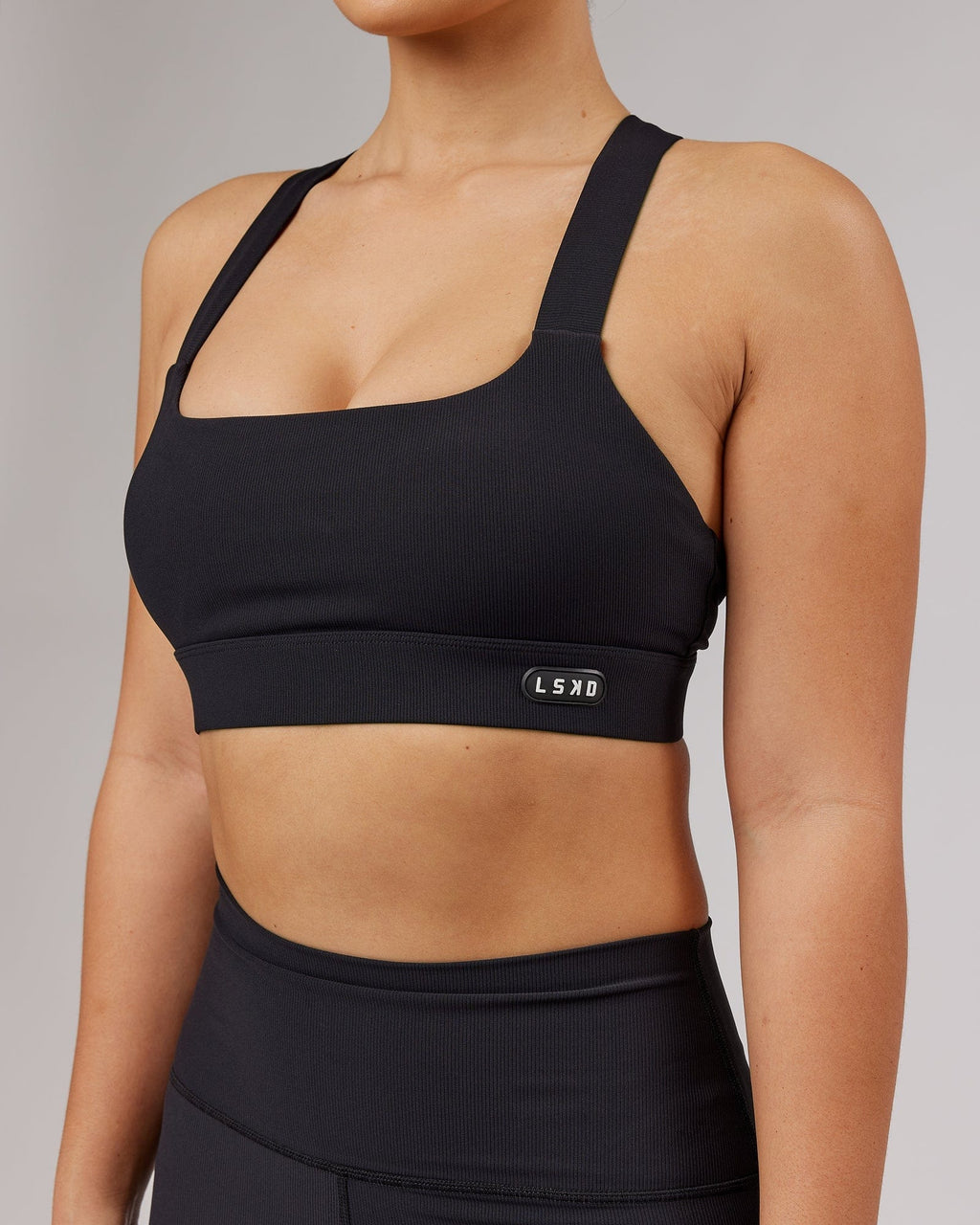 Model wearing Balance Ribbed Sports Bra - Black
