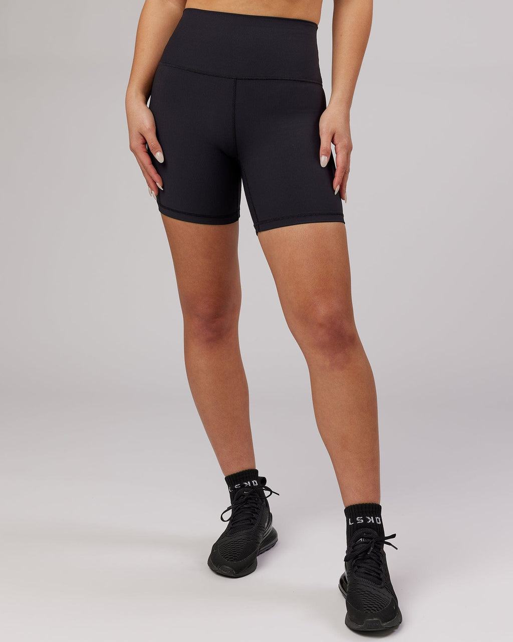 Model wearing Balance Ribbed Mid Short Tight - Black