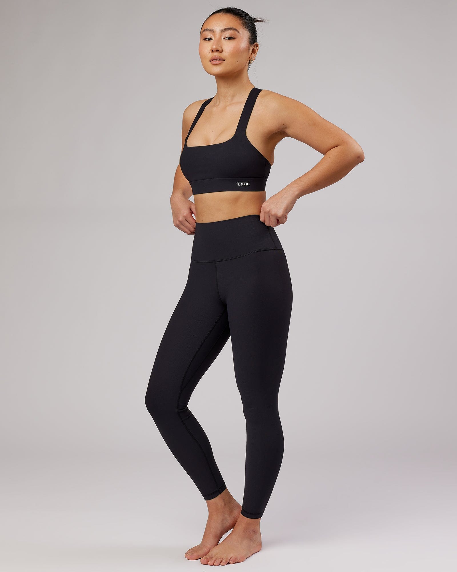 Model wearing Balance Ribbed Full Length Tight - Black