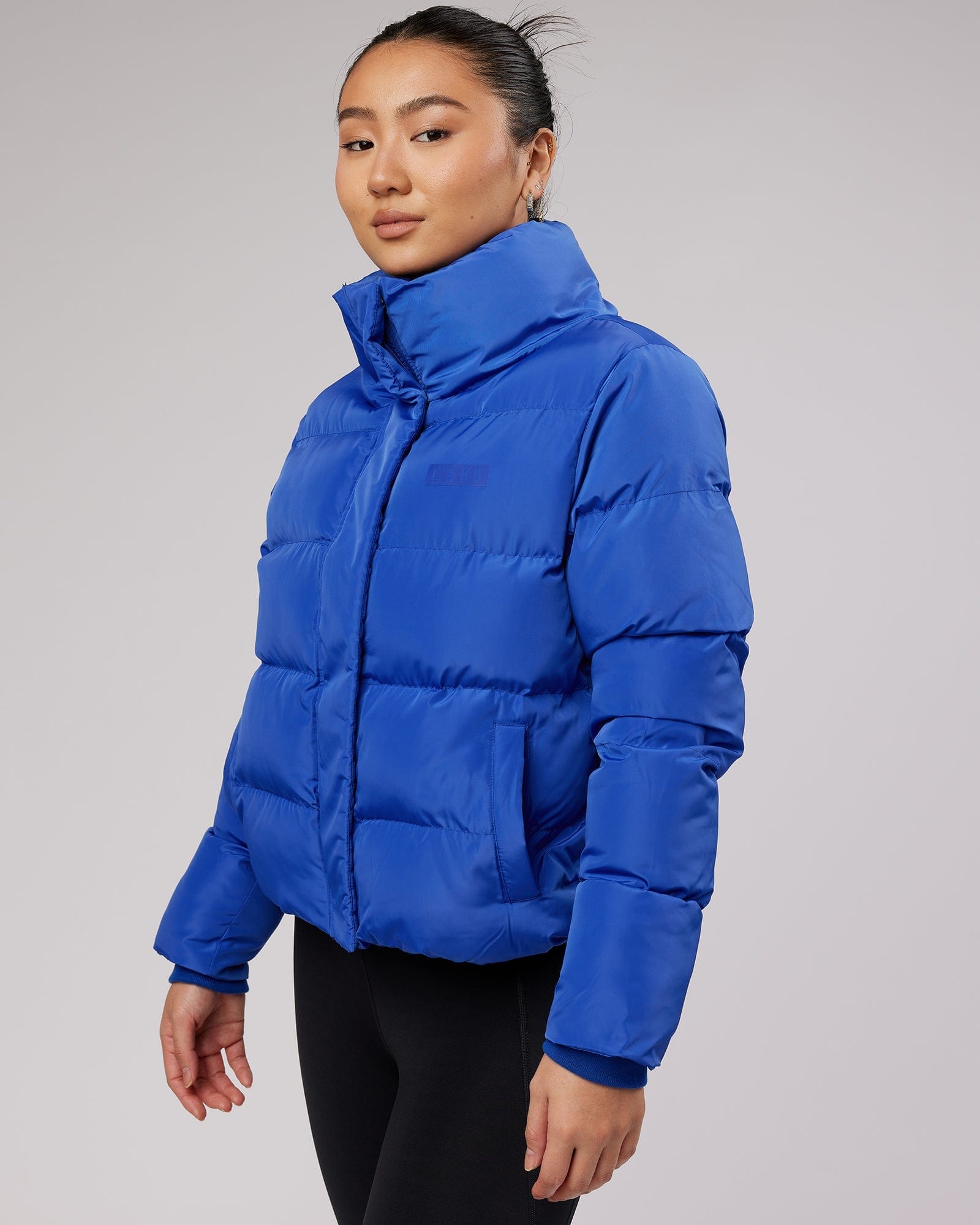 Model wearing Daily Puffer Jacket - Power Cobalt