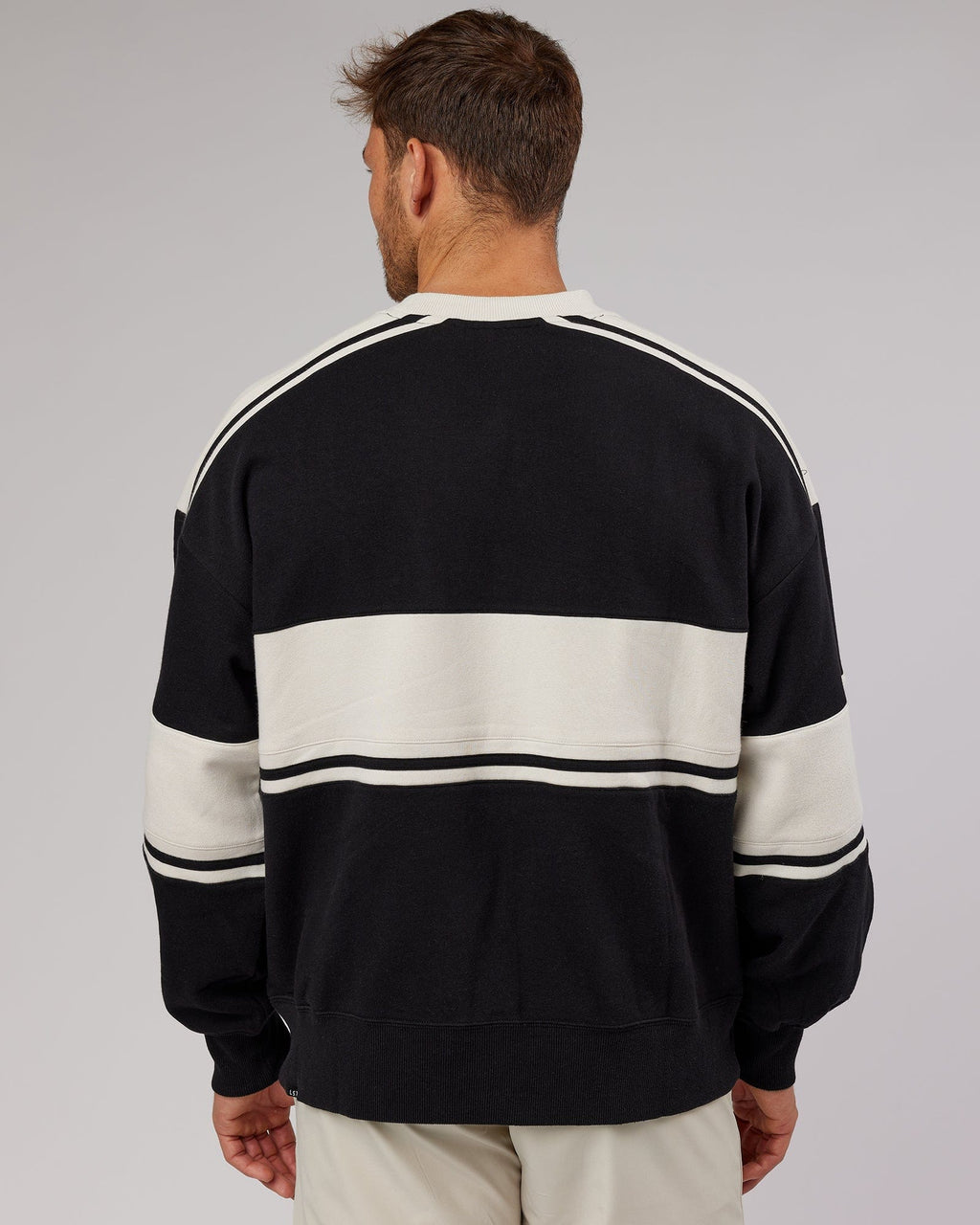 Model wearing Unisex A-Team Sweater Oversize - Black-Bone