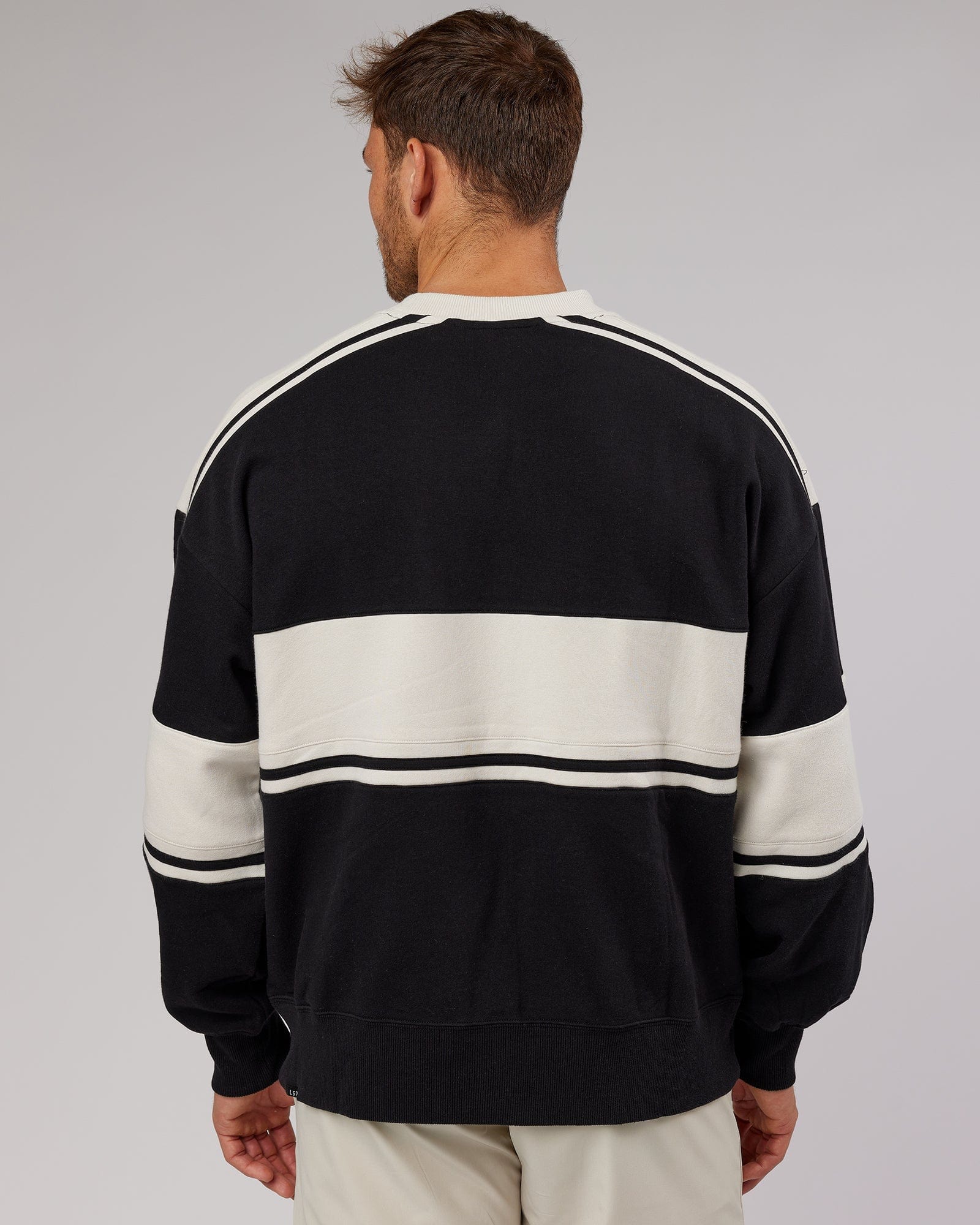 Model wearing Unisex A-Team Sweater Oversize - Black-Bone