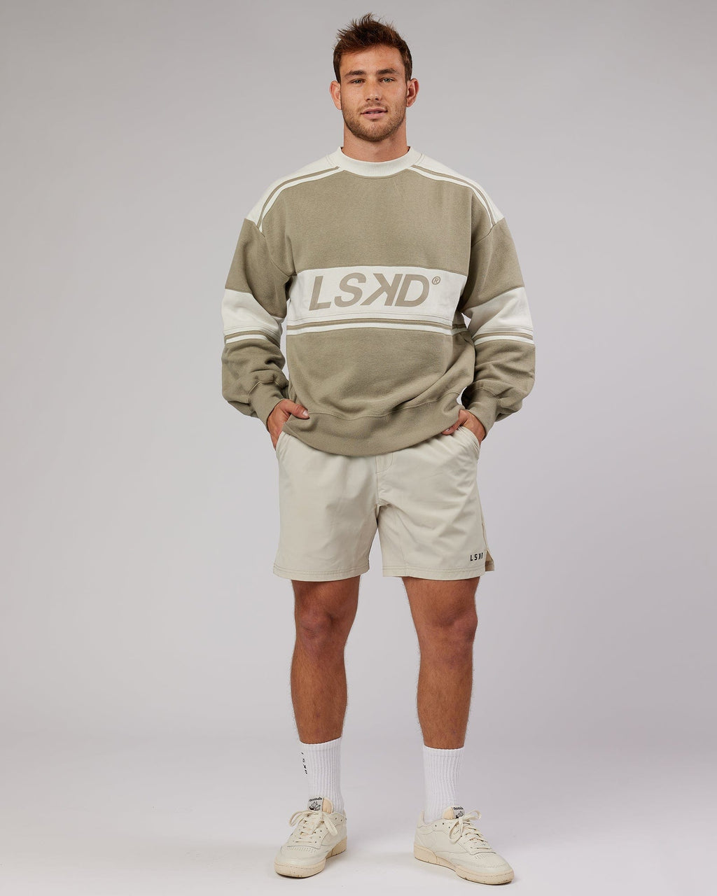 Model wearing Unisex A-Team Sweater Oversize - Laurel Oak-Bone