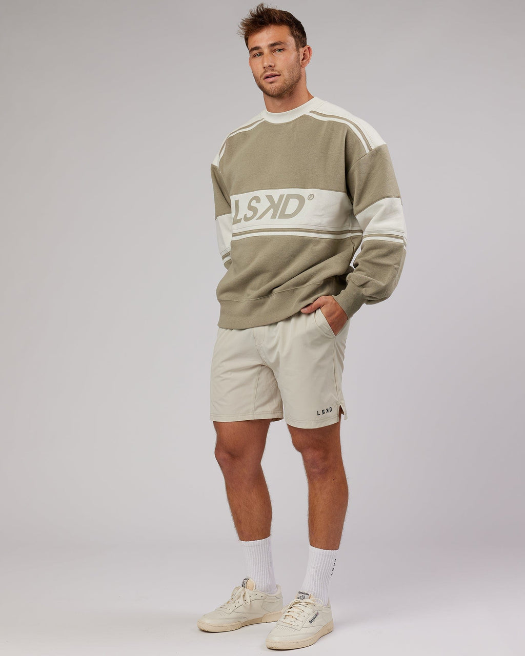 Model wearing Unisex A-Team Sweater Oversize - Laurel Oak-Bone