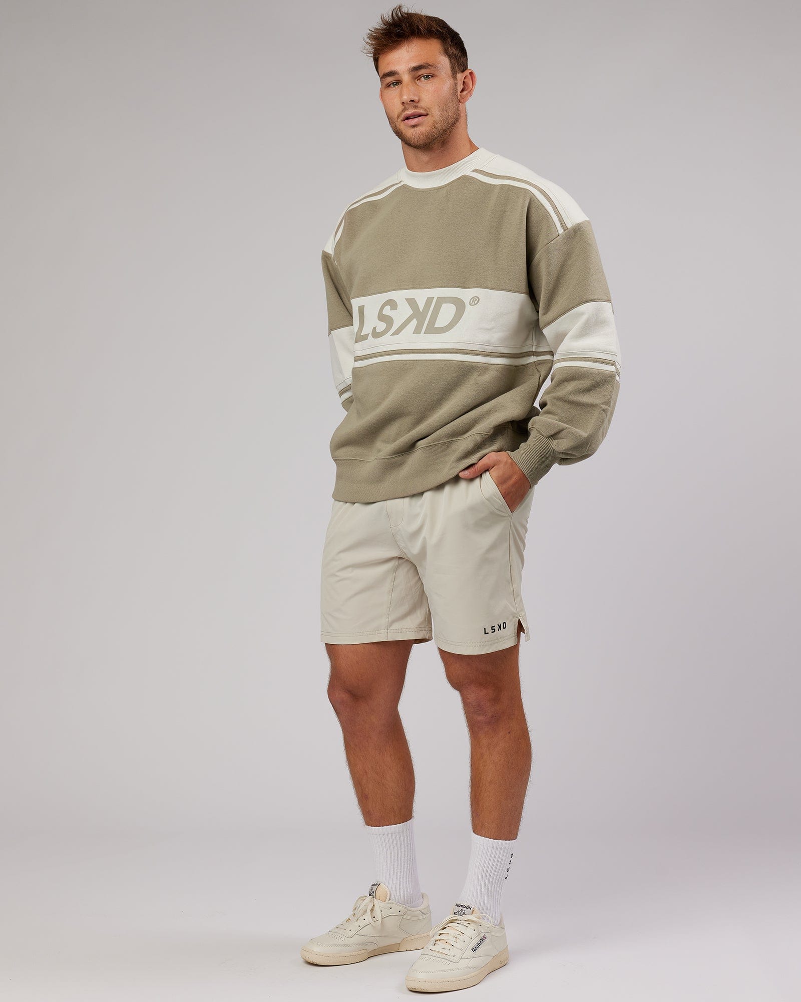 Model wearing Unisex A-Team Sweater Oversize - Laurel Oak-Bone