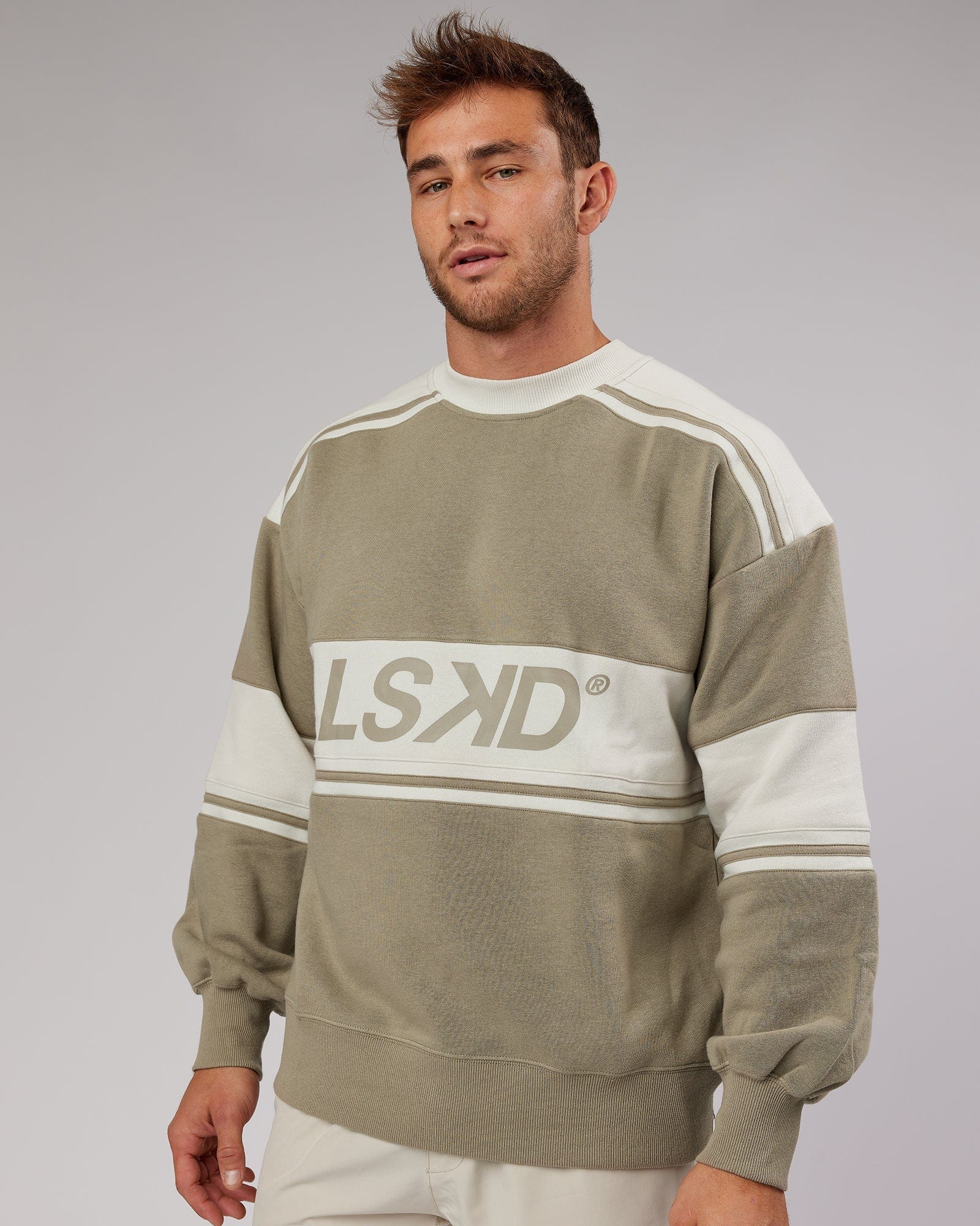 Model wearing Unisex A-Team Sweater Oversize - Laurel Oak-Bone