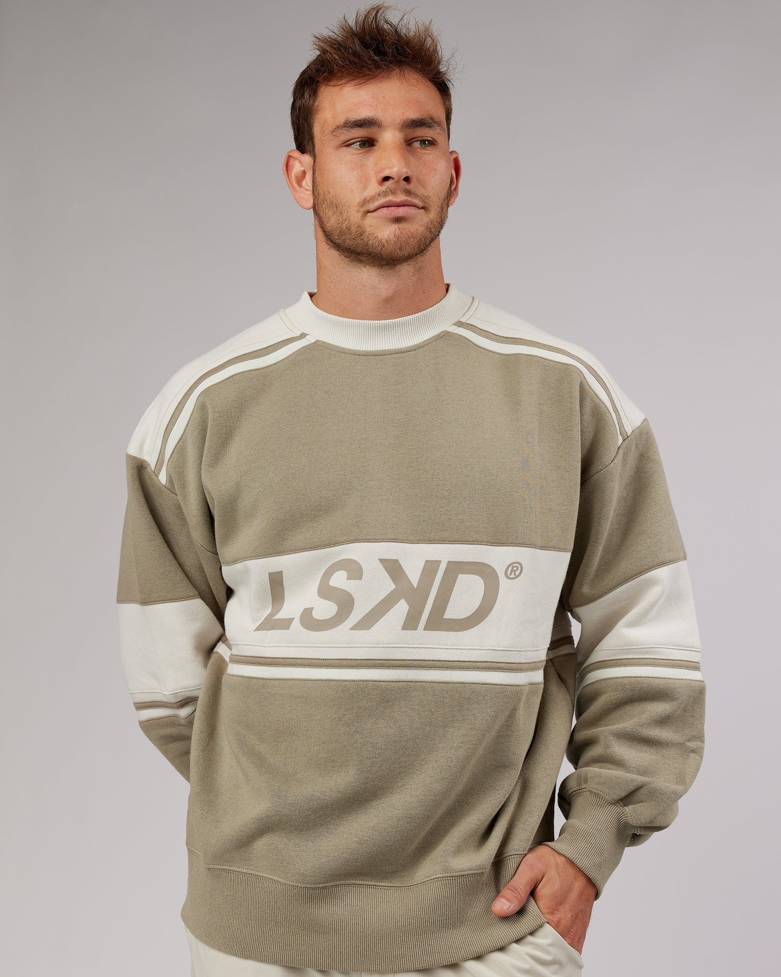 Model wearing Unisex A-Team Sweater Oversize - Laurel Oak-Bone