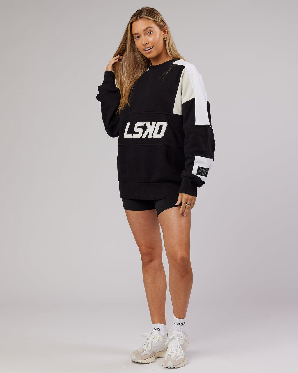 Model wearing Unisex Slam Oversize Sweater - Black-Bone