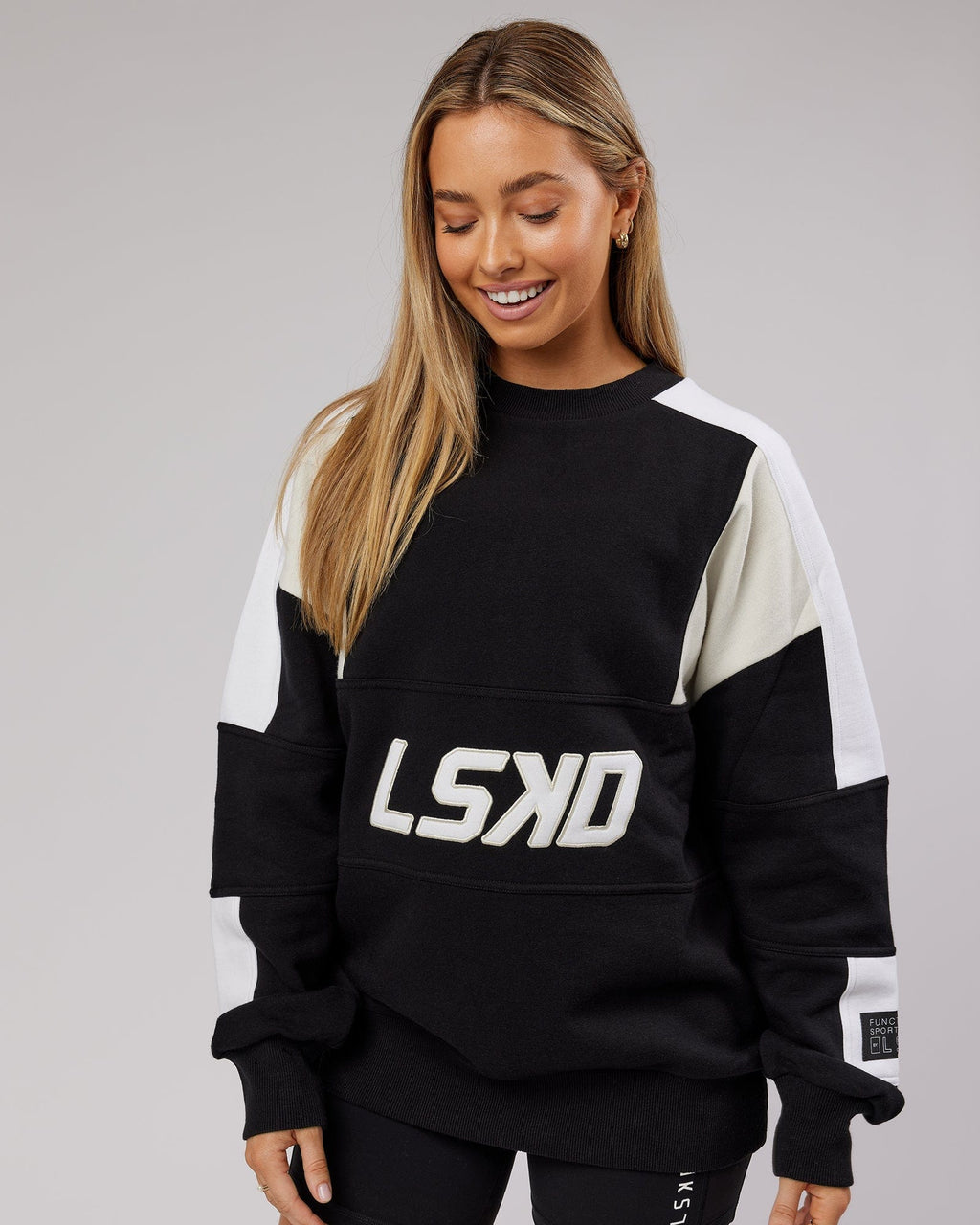 Model wearing Unisex Slam Oversize Sweater - Black-Bone