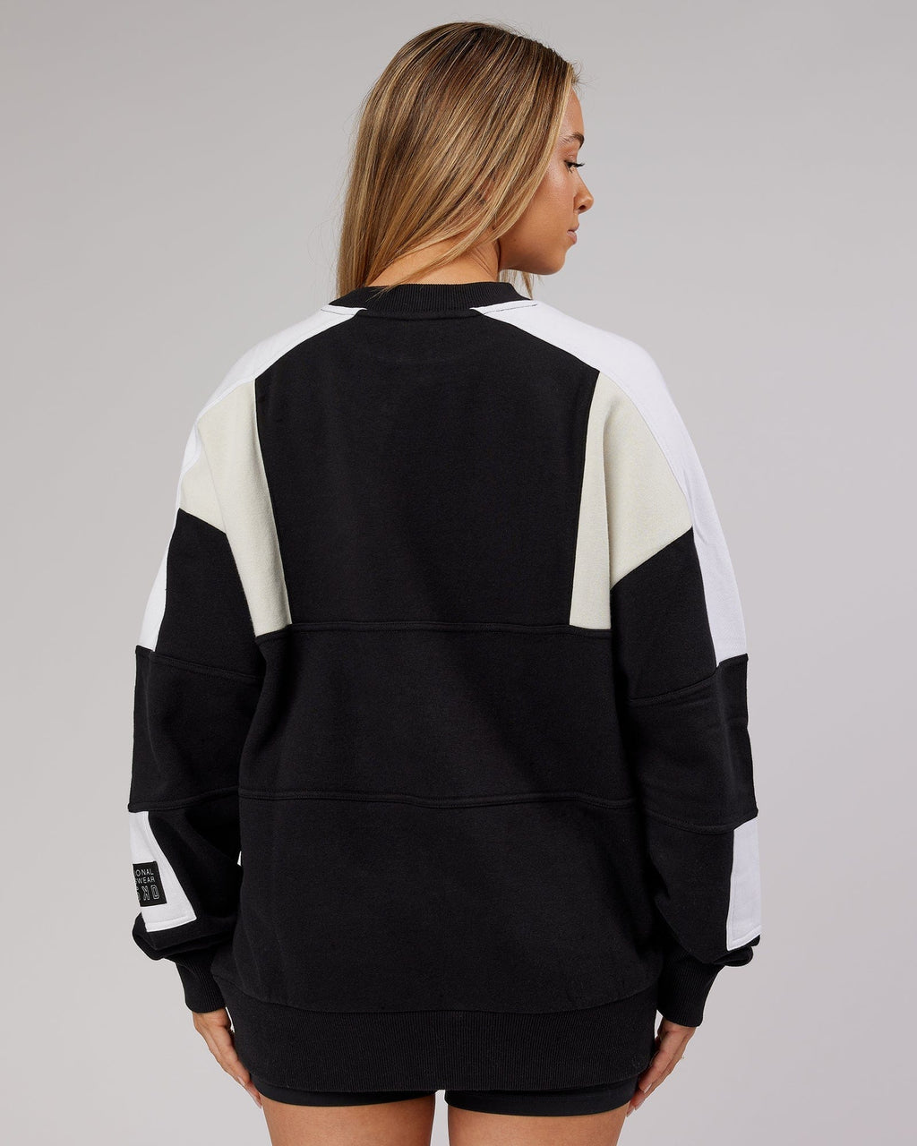 Model wearing Unisex Slam Oversize Sweater - Black-Bone