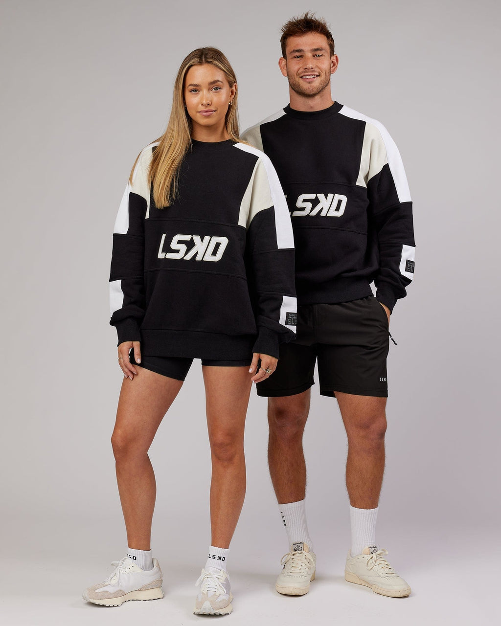 Model wearing Unisex Slam Oversize Sweater - Black-Bone