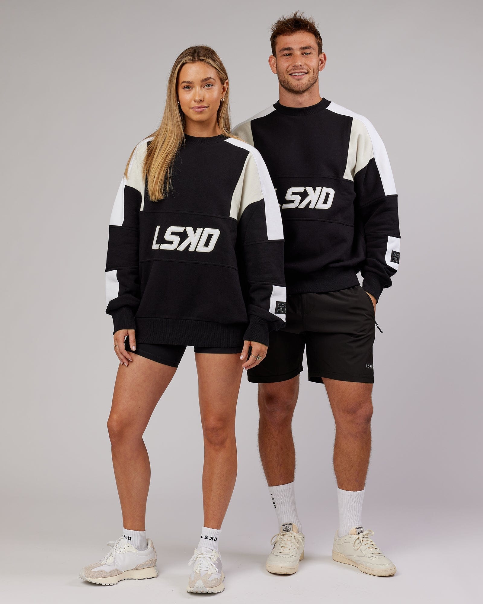 Model wearing Unisex Slam Oversize Sweater - Black-Bone