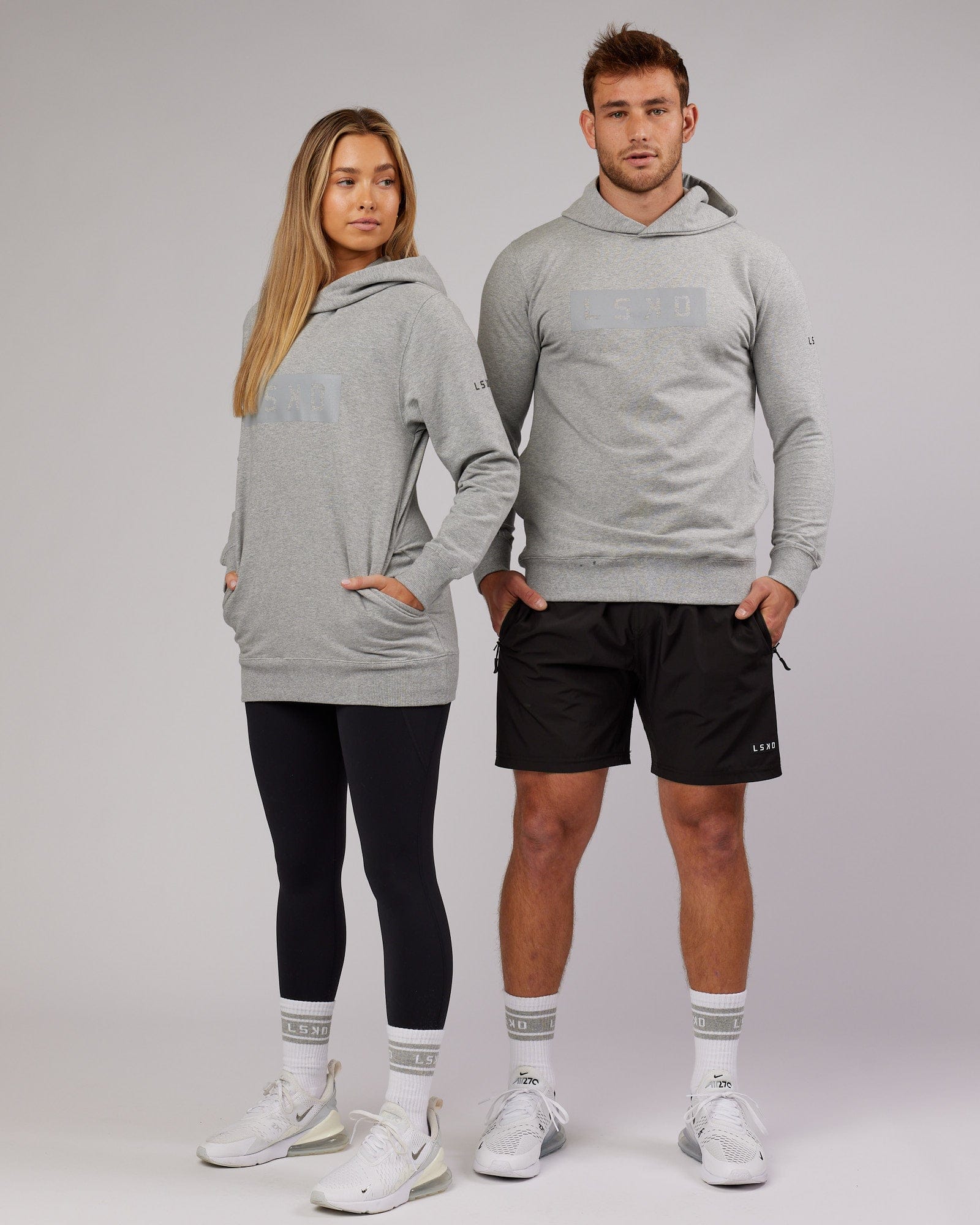 Model wearing Unisex Strength FLXFleece Training Fit Hoodie - Lt Grey Marl