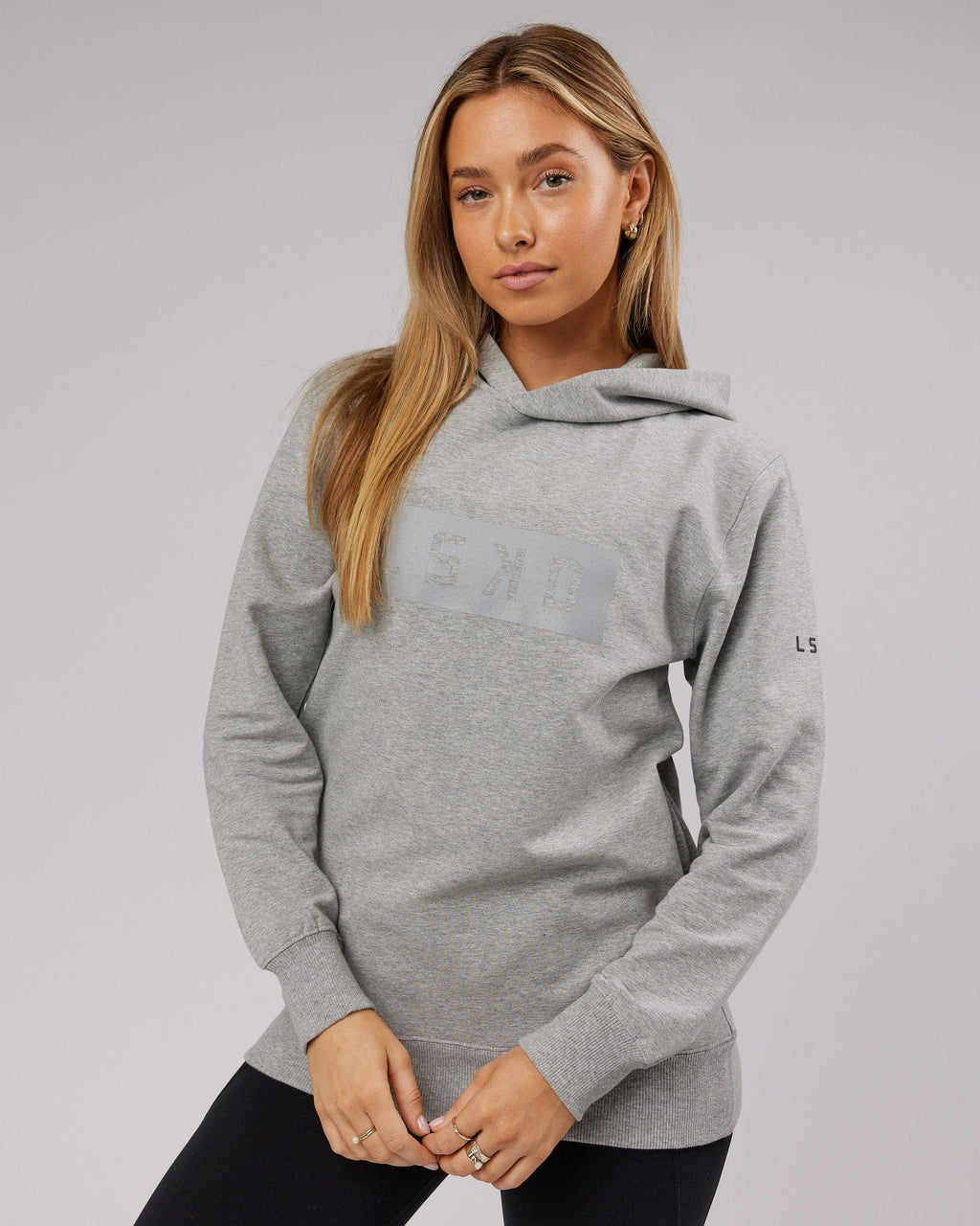 Model wearing Unisex Strength FLXFleece Training Fit Hoodie - Lt Grey Marl
