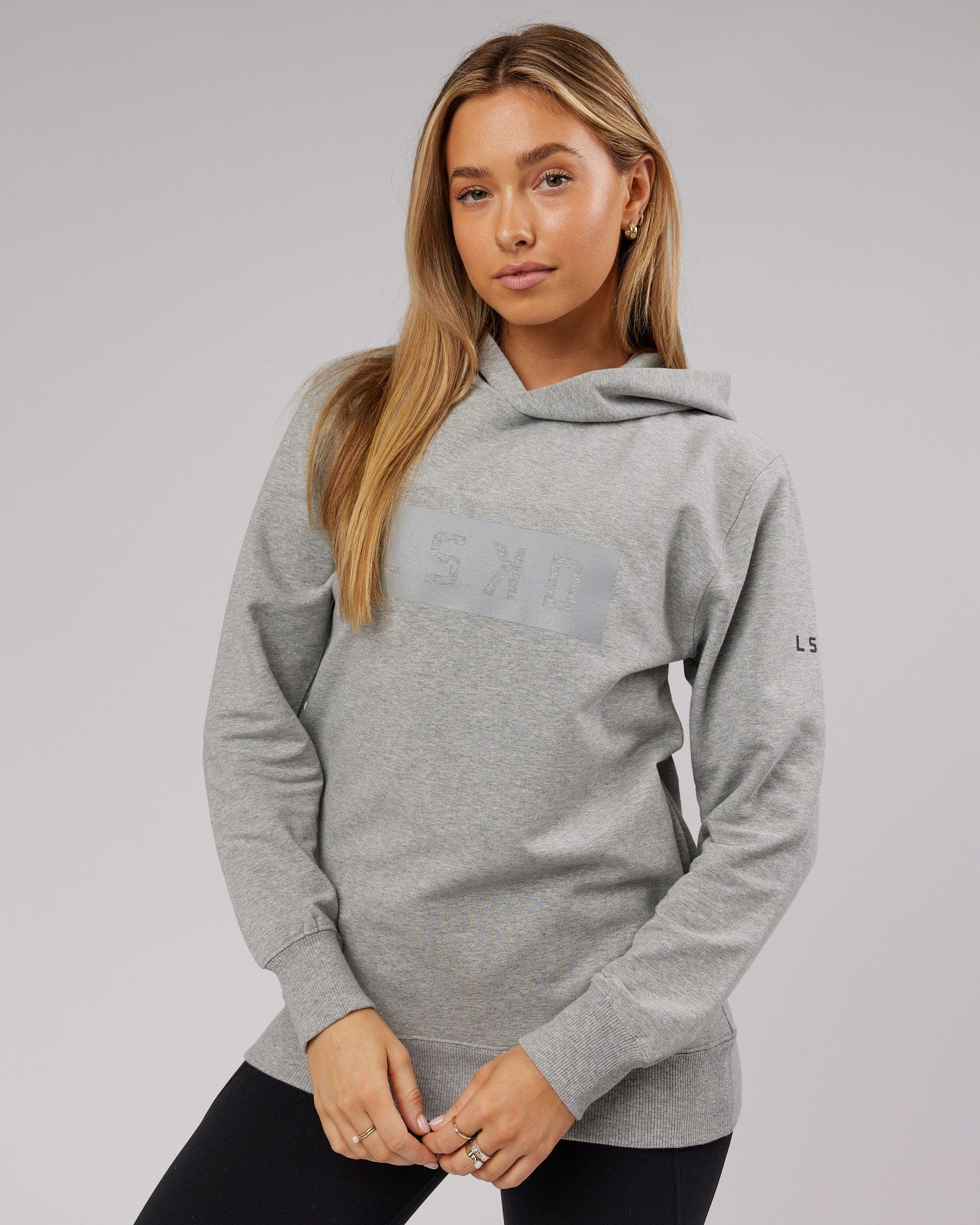 Model wearing Unisex Strength FLXFleece Training Fit Hoodie - Lt Grey Marl
