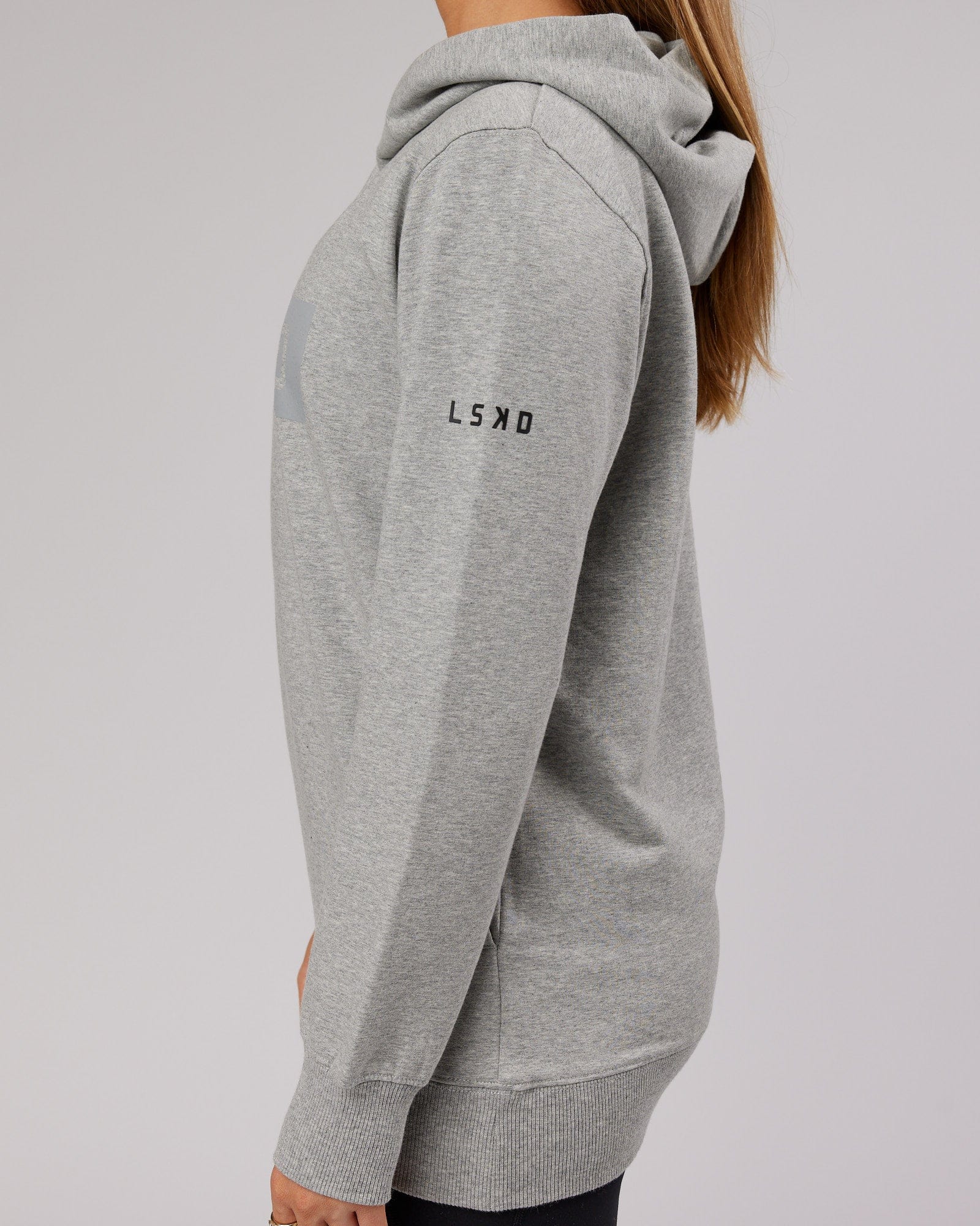Model wearing Unisex Strength FLXFleece Training Fit Hoodie - Lt Grey Marl