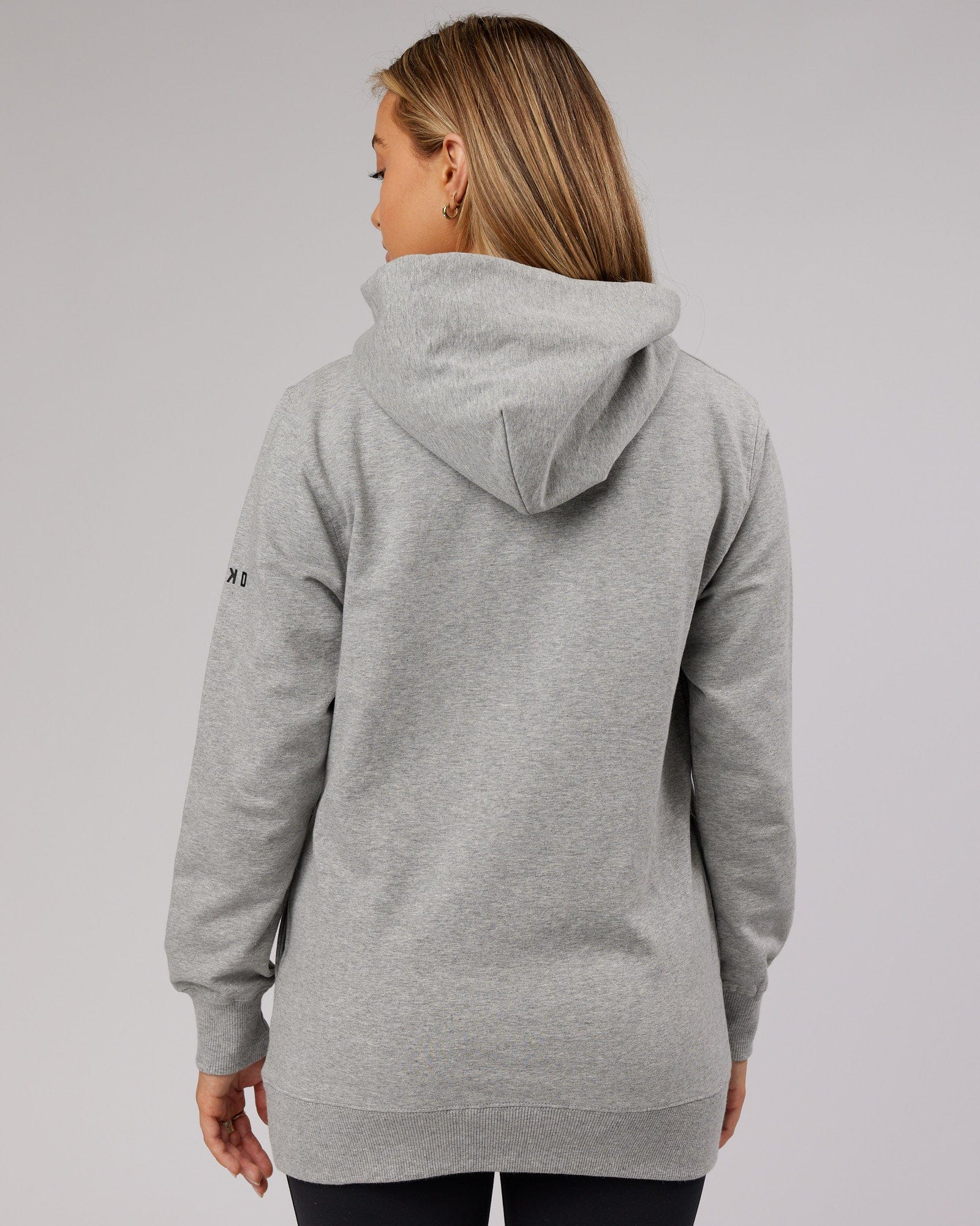 Model wearing Unisex Strength FLXFleece Training Fit Hoodie - Lt Grey Marl