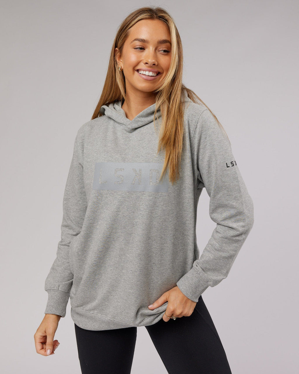 Model wearing Unisex Strength FLXFleece Training Fit Hoodie - Lt Grey Marl