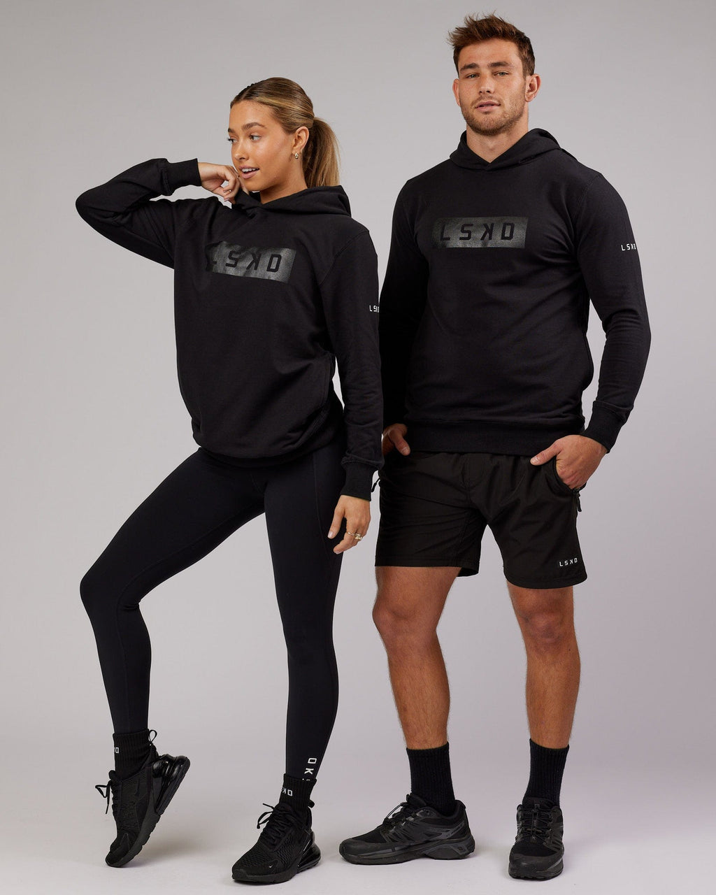 Model wearing Unisex Strength FLXFleece Training Fit Hoodie - Black